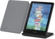 A Kindle Colorsoft on a wireless charger