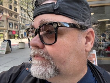 the author wearing nuance hearing glasses in new york city