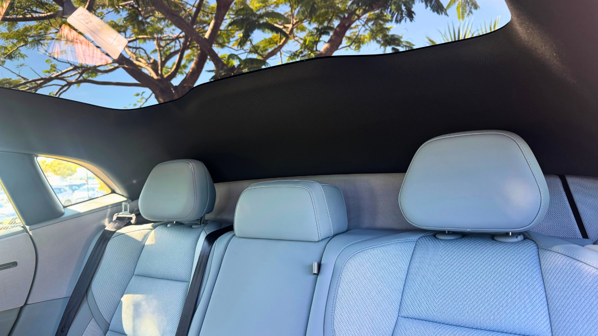The back seat of the Polestar 4, showing the lack of rear window,