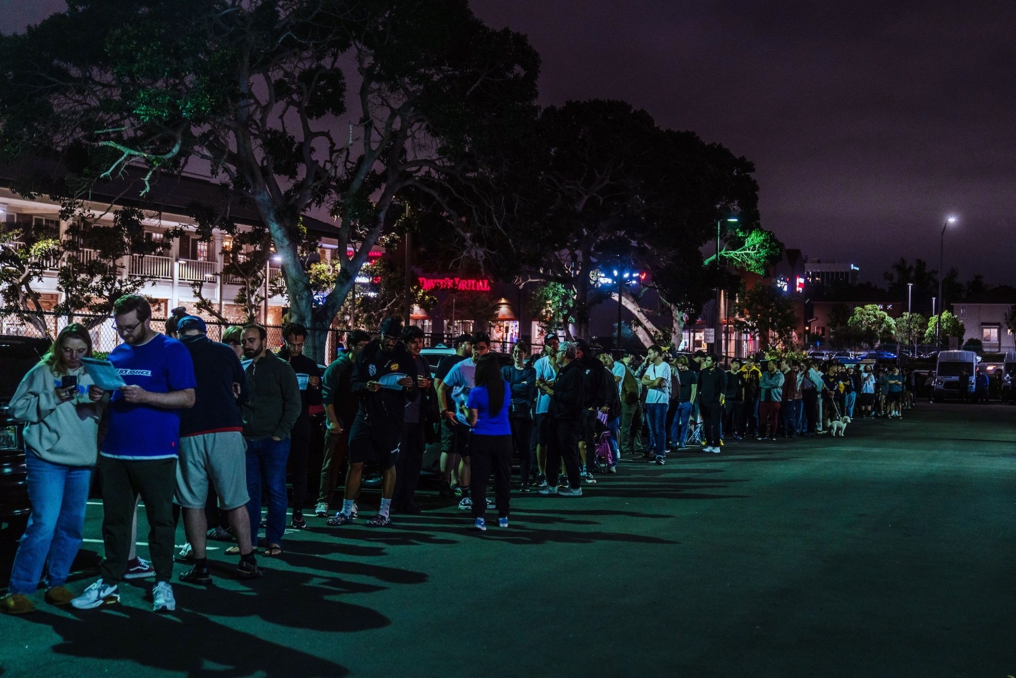 Customers wait in line outside a Best Buy in San Diego, California.
