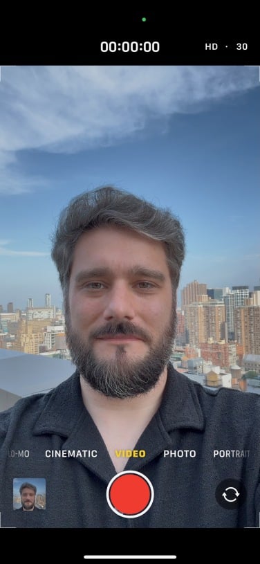 the author appears in a selfie on iphone screen