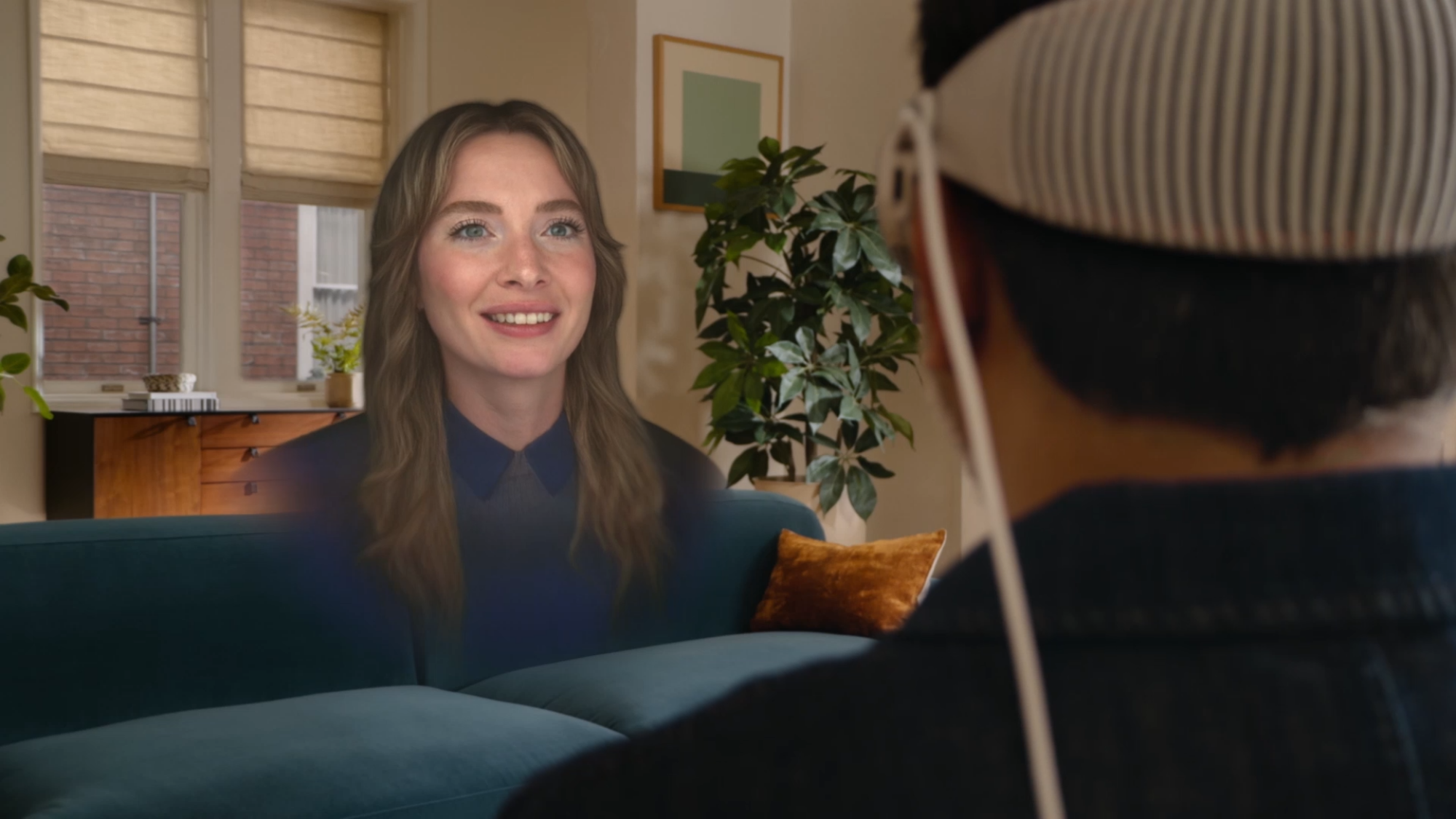 a person talking to a Persona with Vision Pro