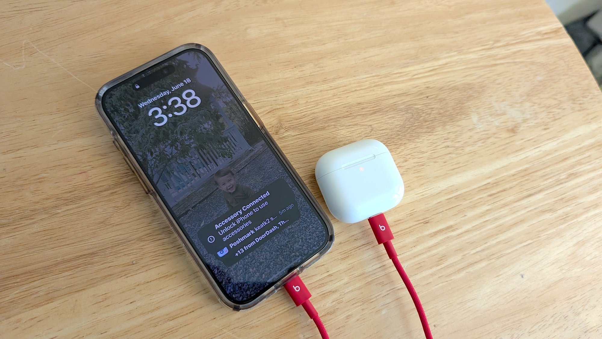 apple iphone and airpods connected by beats cable for reverse charging