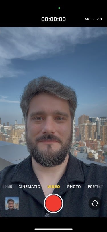 the author appears in a selfie on iphone screen in 4k