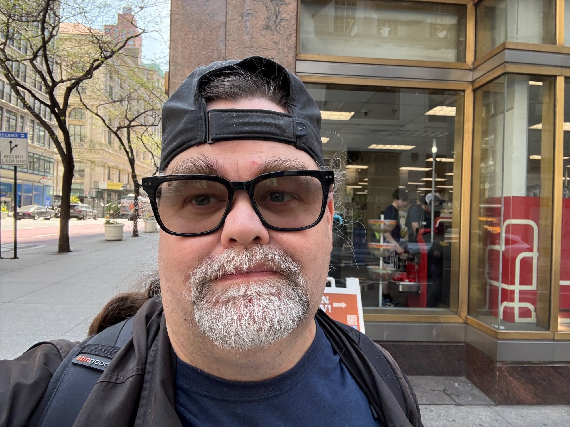 the author wearing nuance hearing glasses