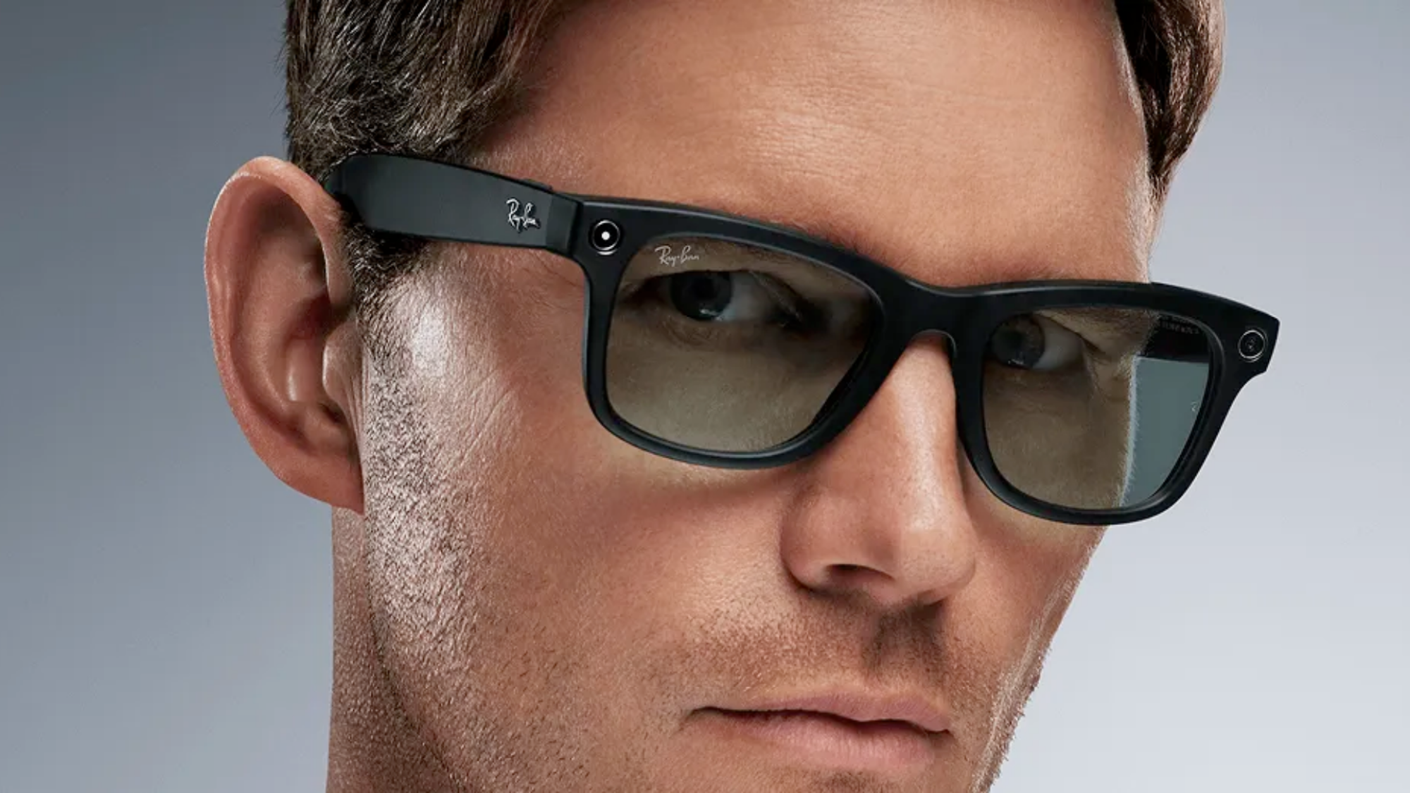 A man wearing Ray-Ban Meta smart glasses.