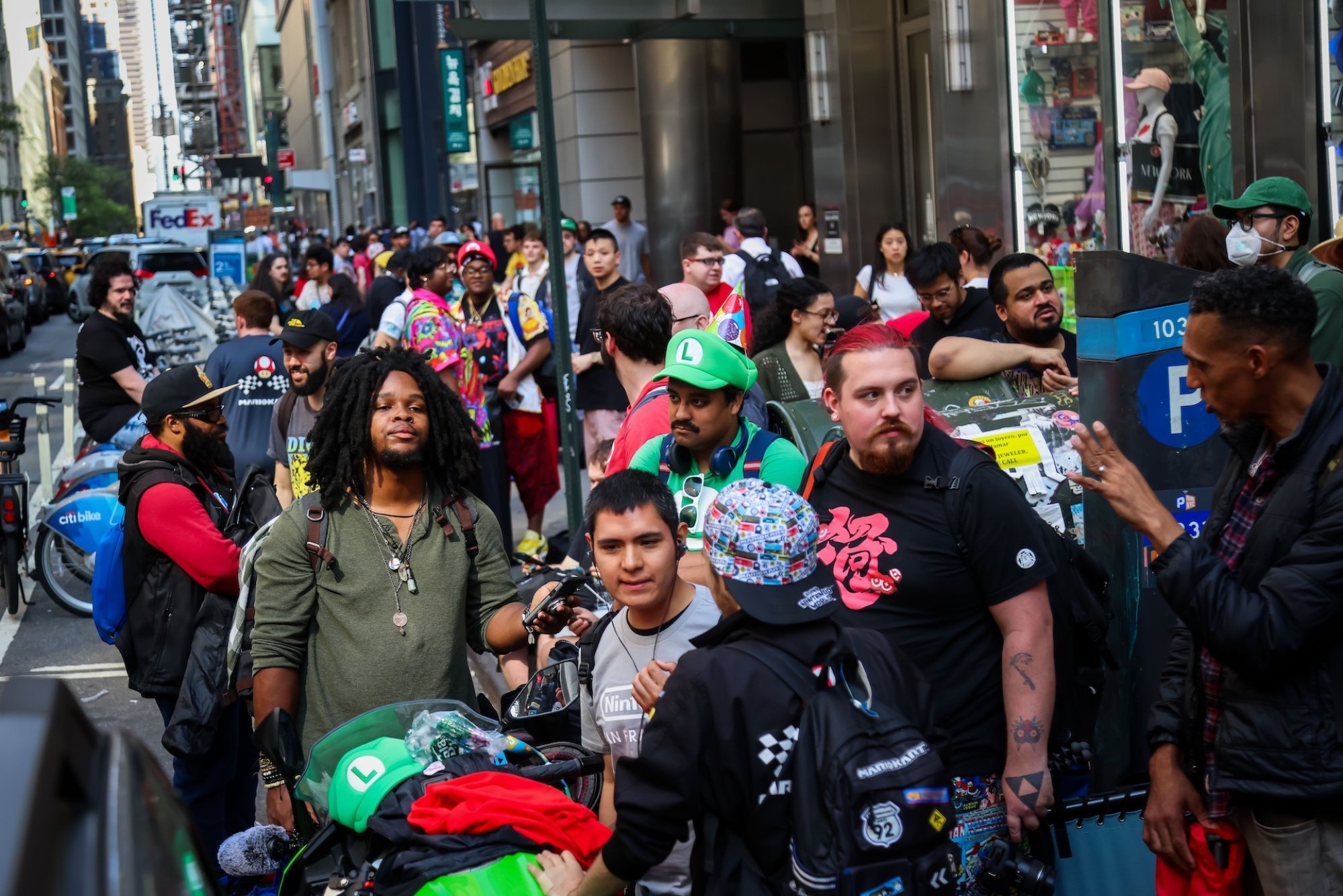 Customers wait in line outside the Nintendo store in New York City.