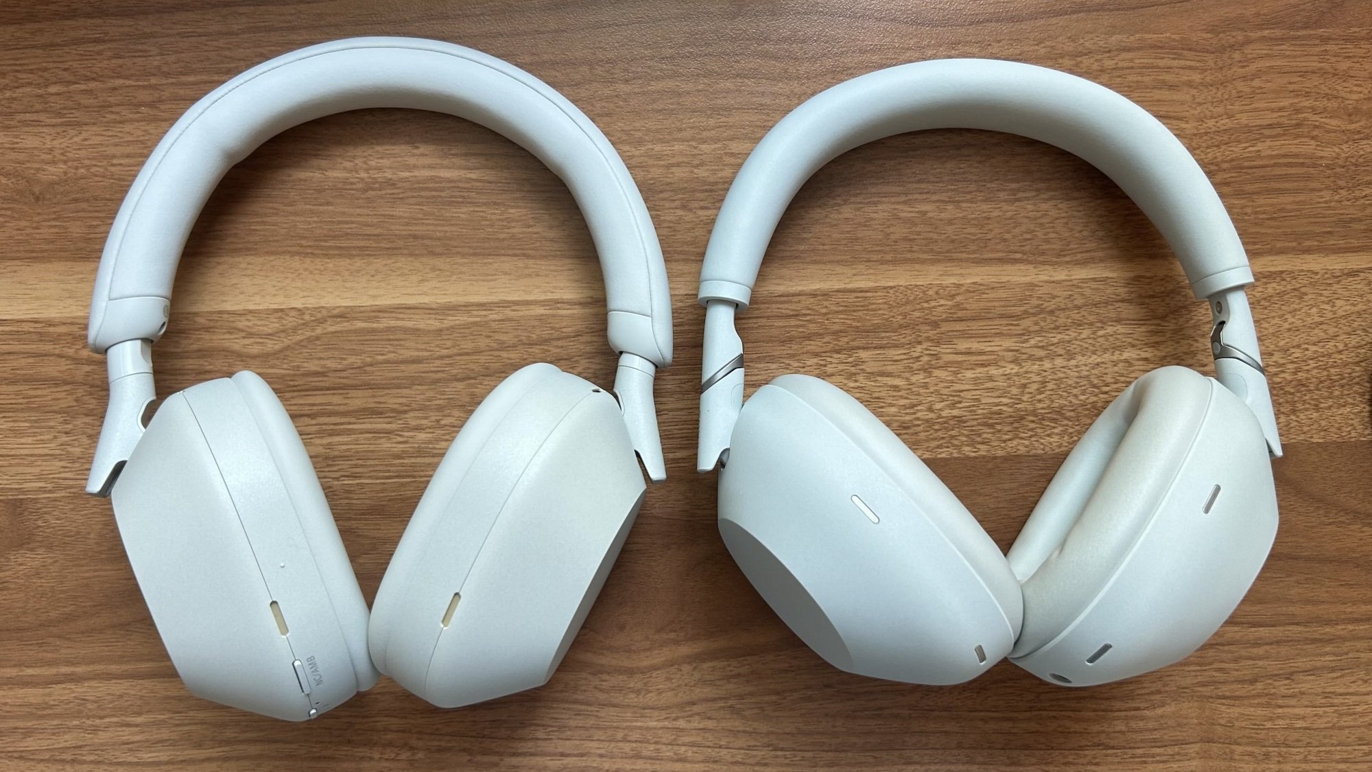 the sony xm5 headphones next to the sony xm6 headphones