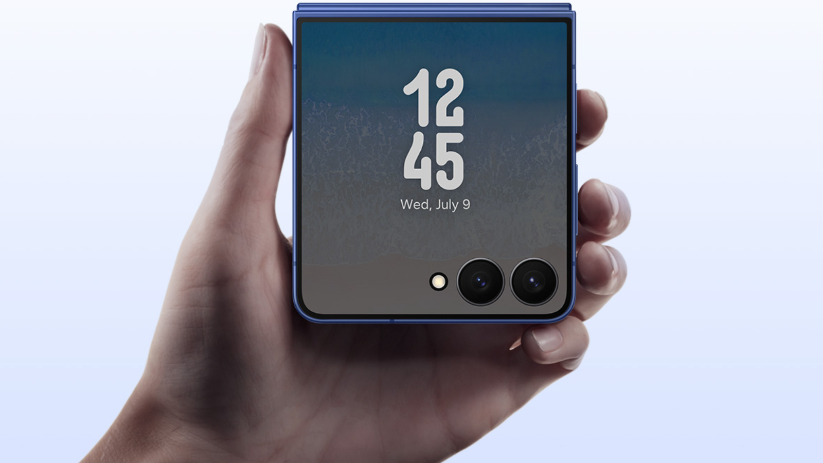 hand holding Samsung Galaxy Flip7 phone