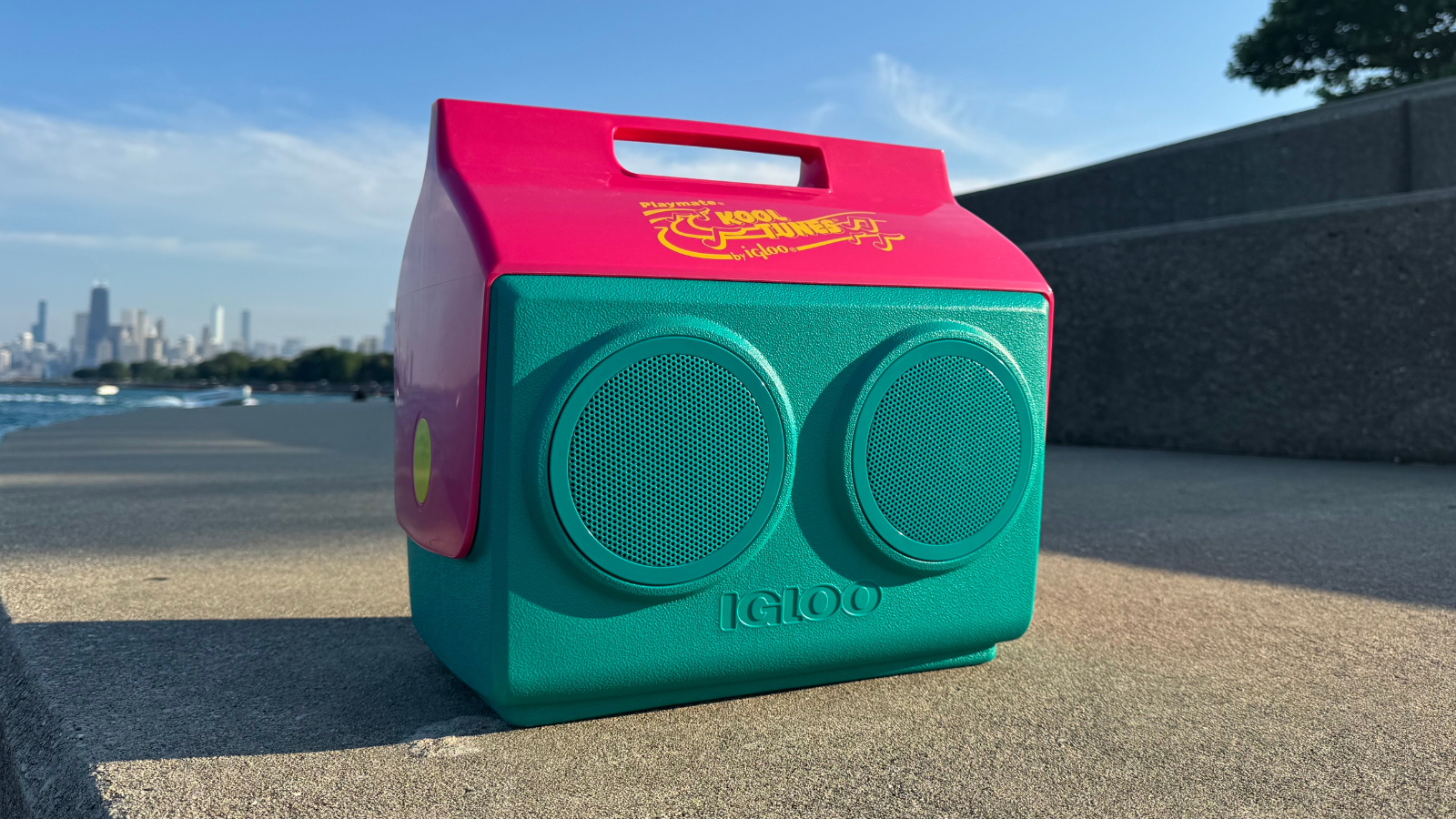 an igloo kooltunes on concrete steps along the shore of lake michigan in chicago