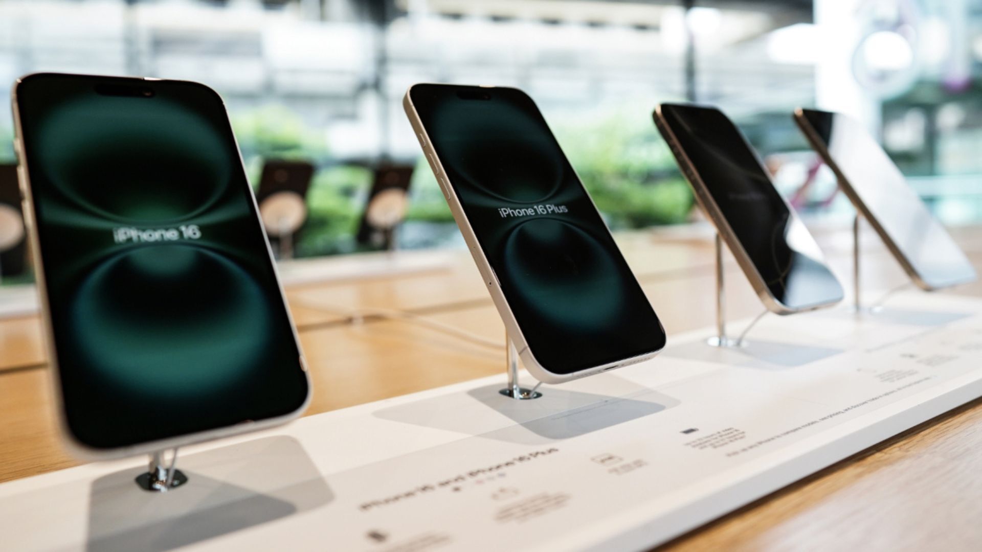 iPhones on display at an Apple store.