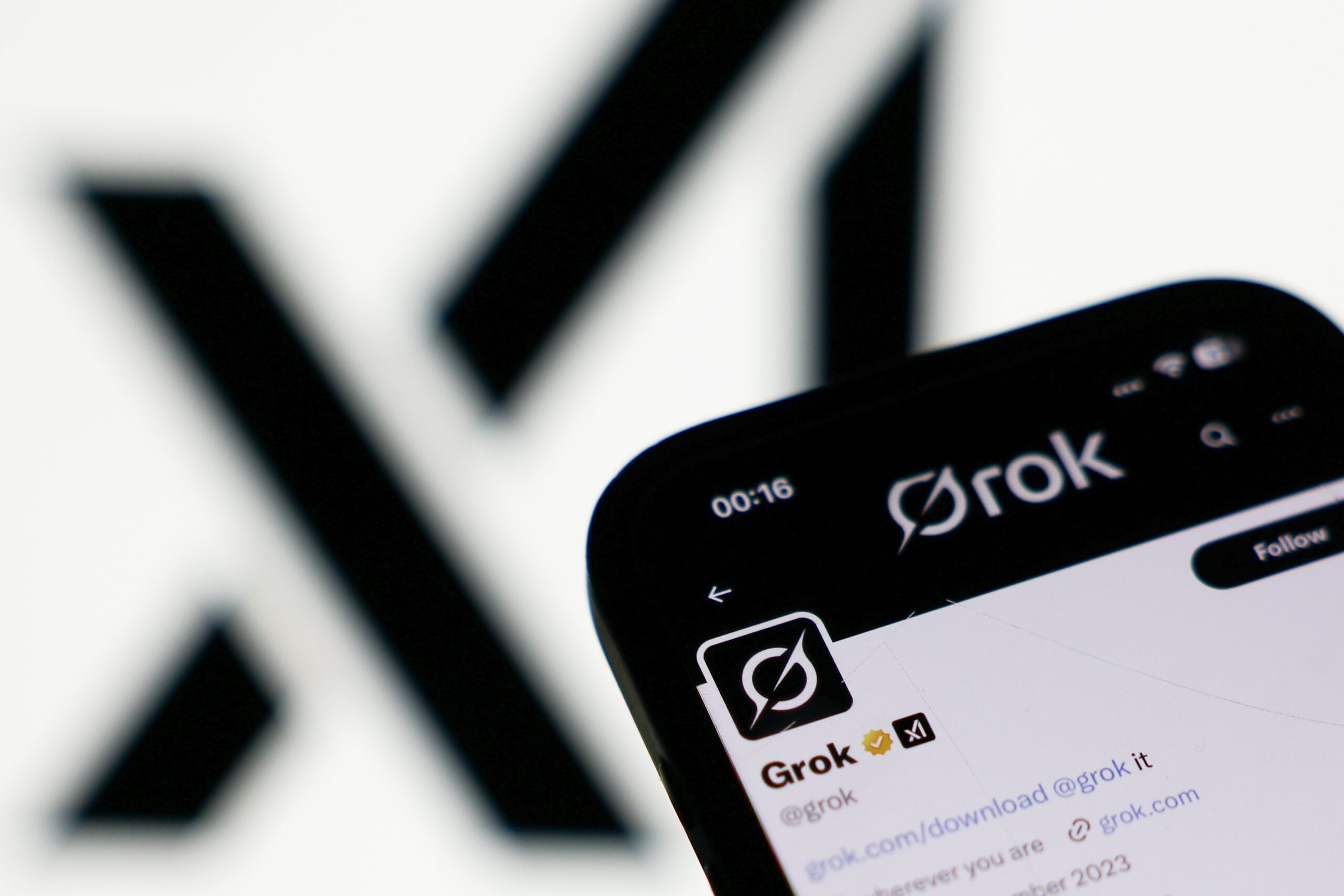 xai logo and grok logo on phones 