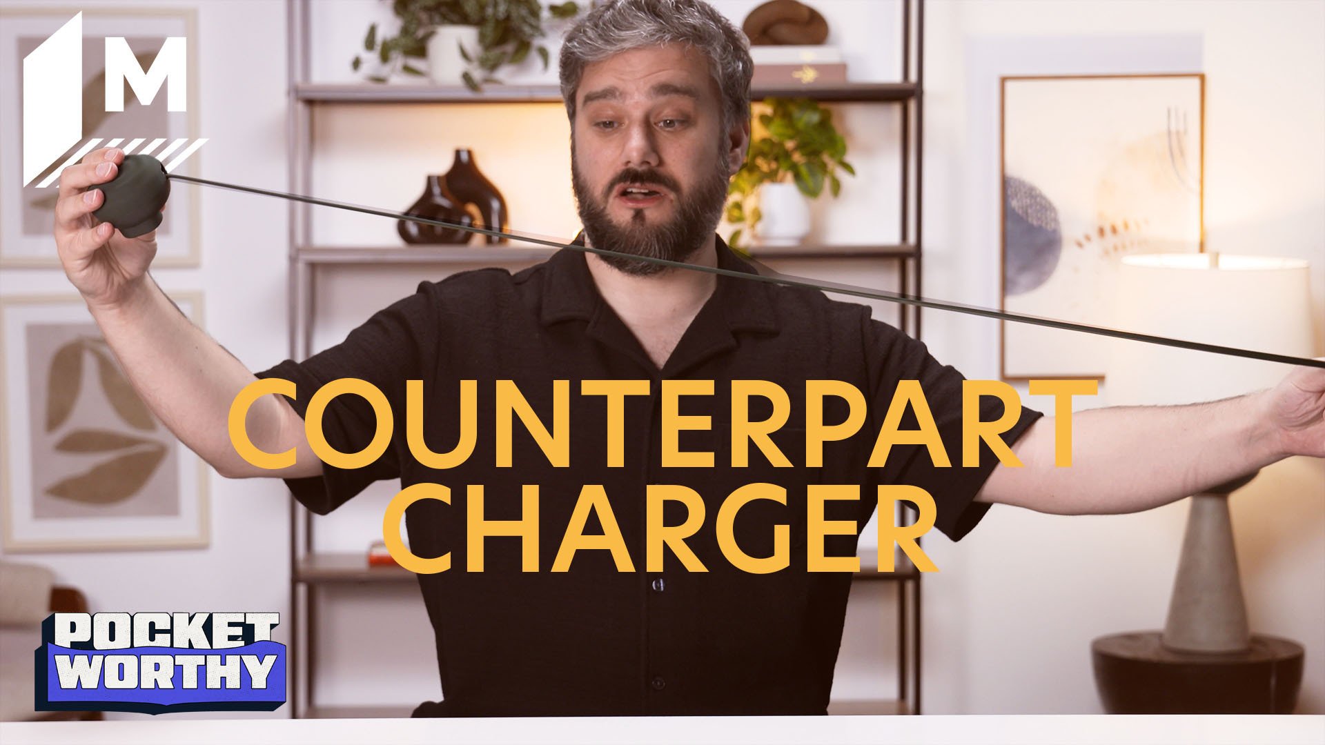 Timothy Werth holding the Counterpart charger