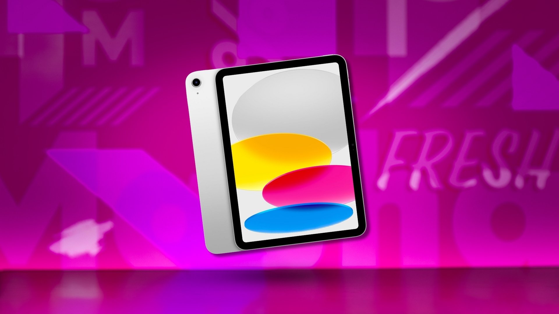 Apple ipad on pink background