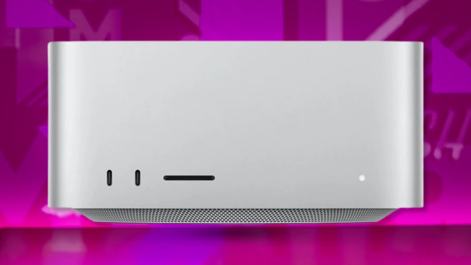 The 2023 Apple Mac Studio with M2 Max on a purple background