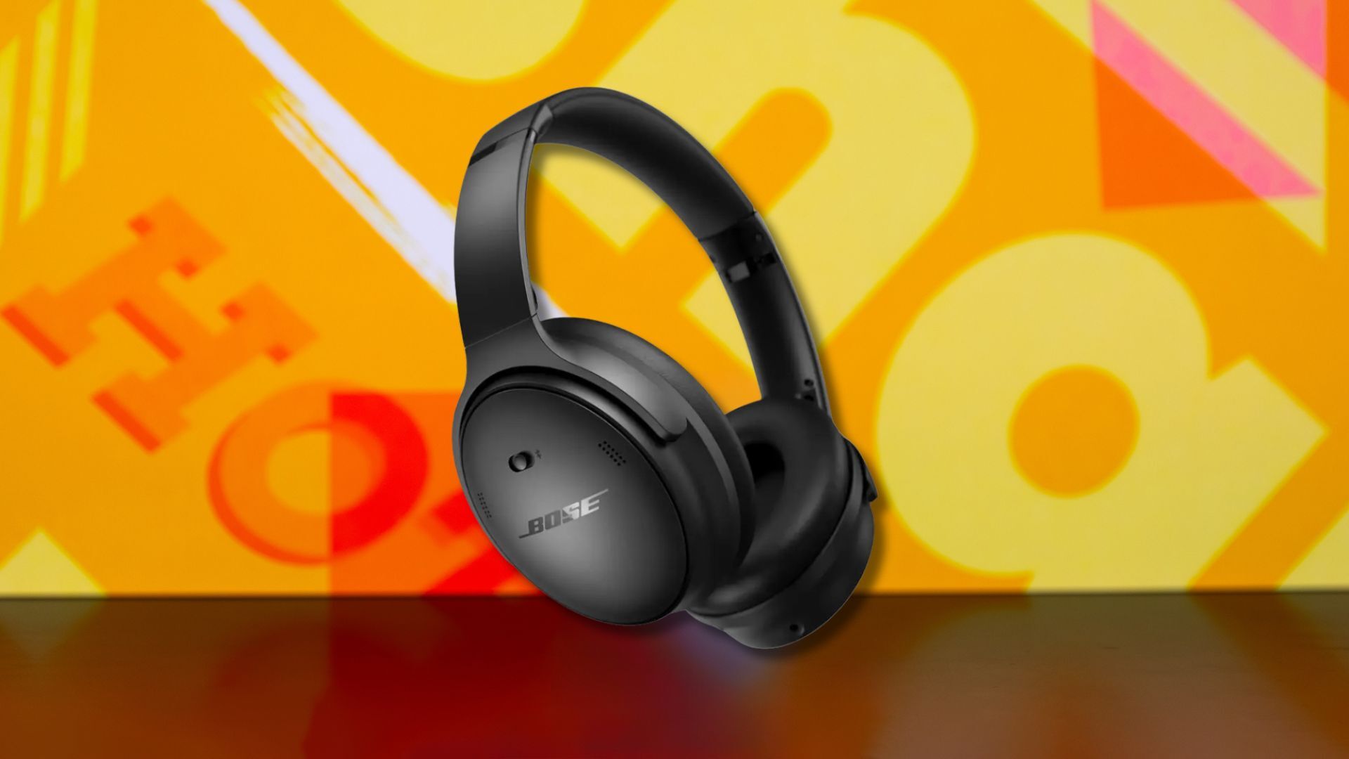 bose quietcomfort headphones against a yellow patterned background