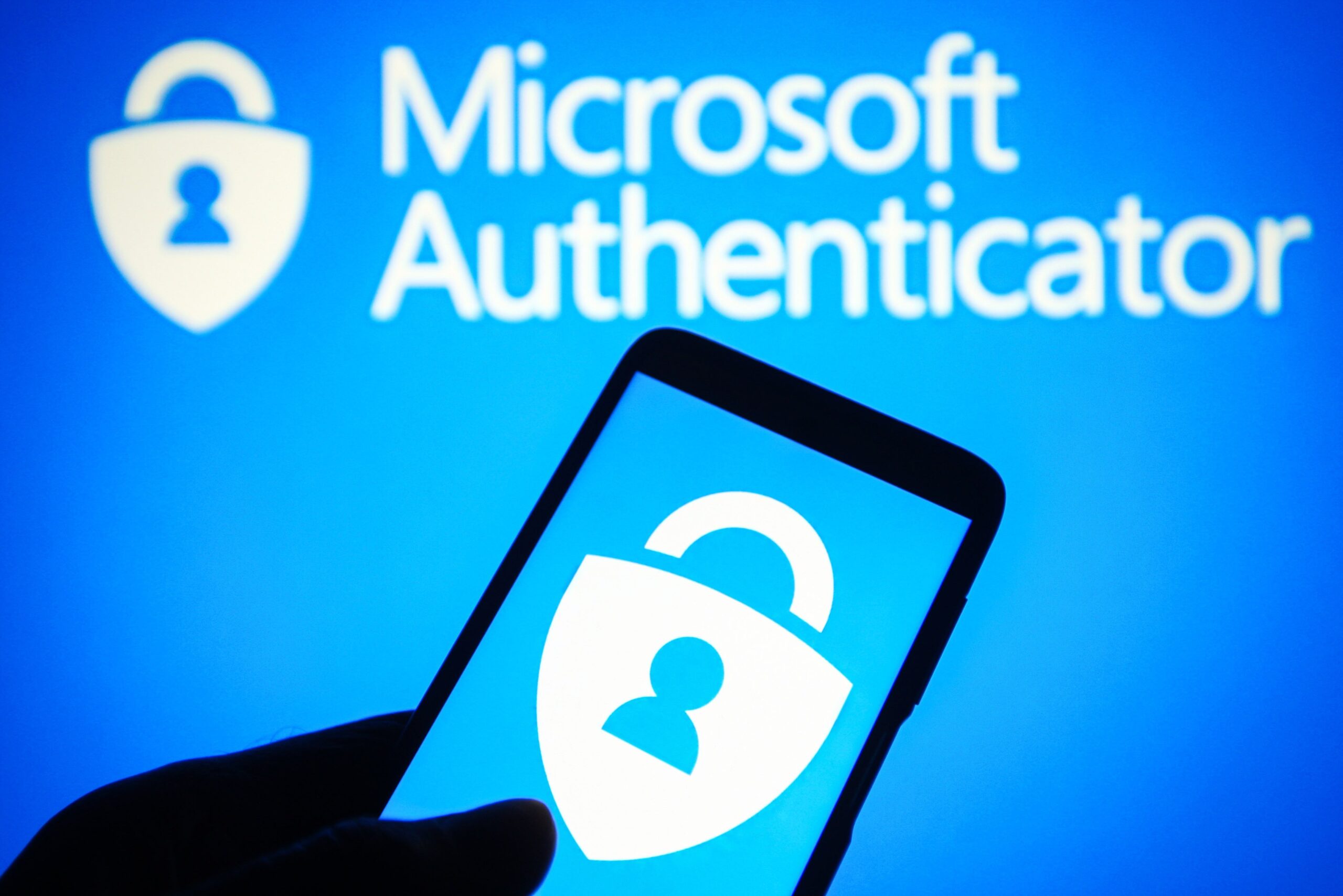 microsoft authenticator logo with a phone in front view