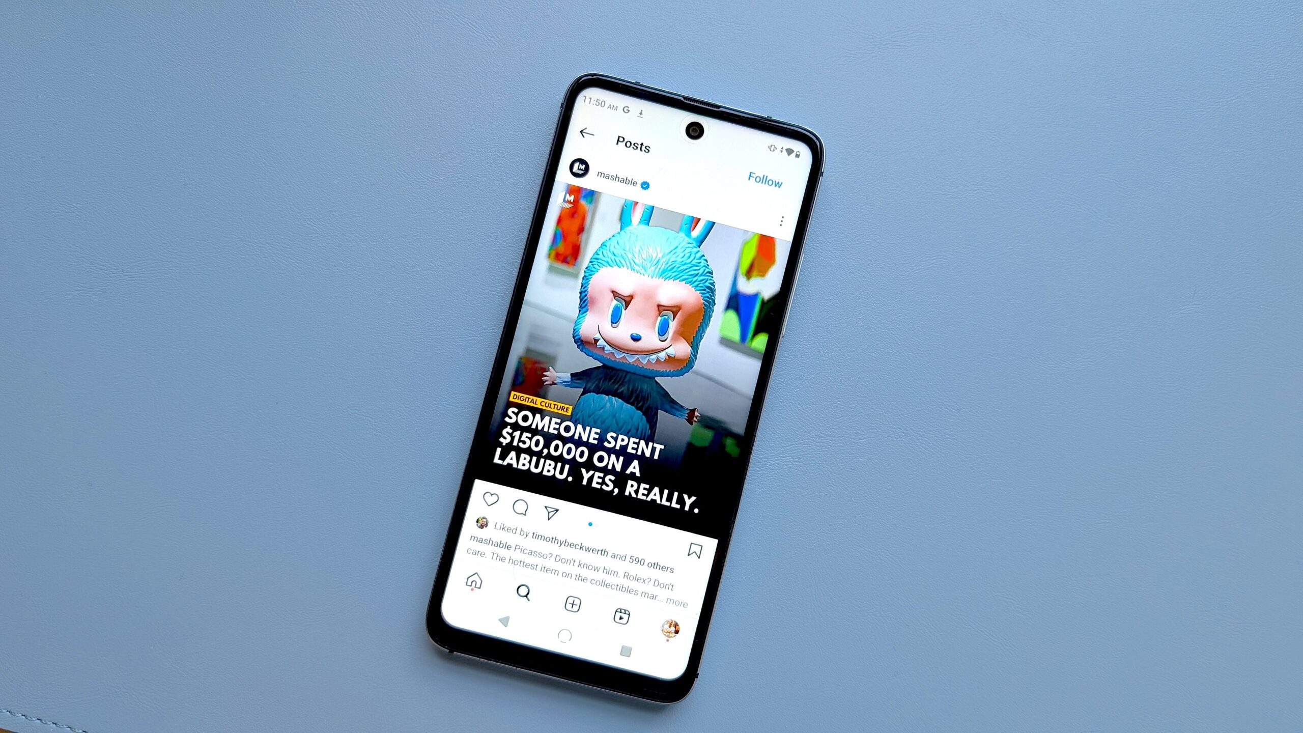 nuu 10 smartphone displaying mashable article about labubu on screen