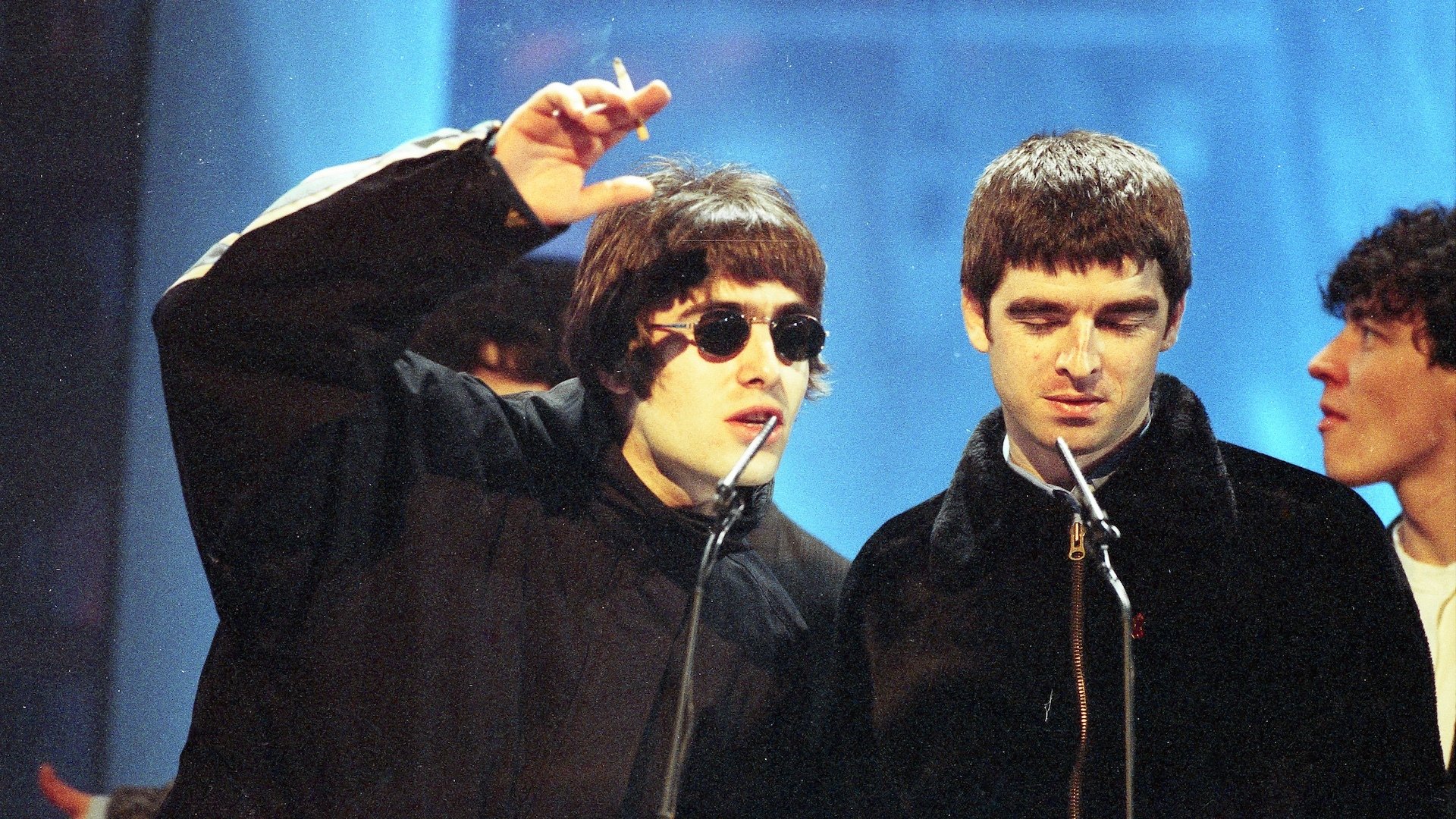 Liam and Noel Gallagher of Oasis attend The BRIT Awards 1995.