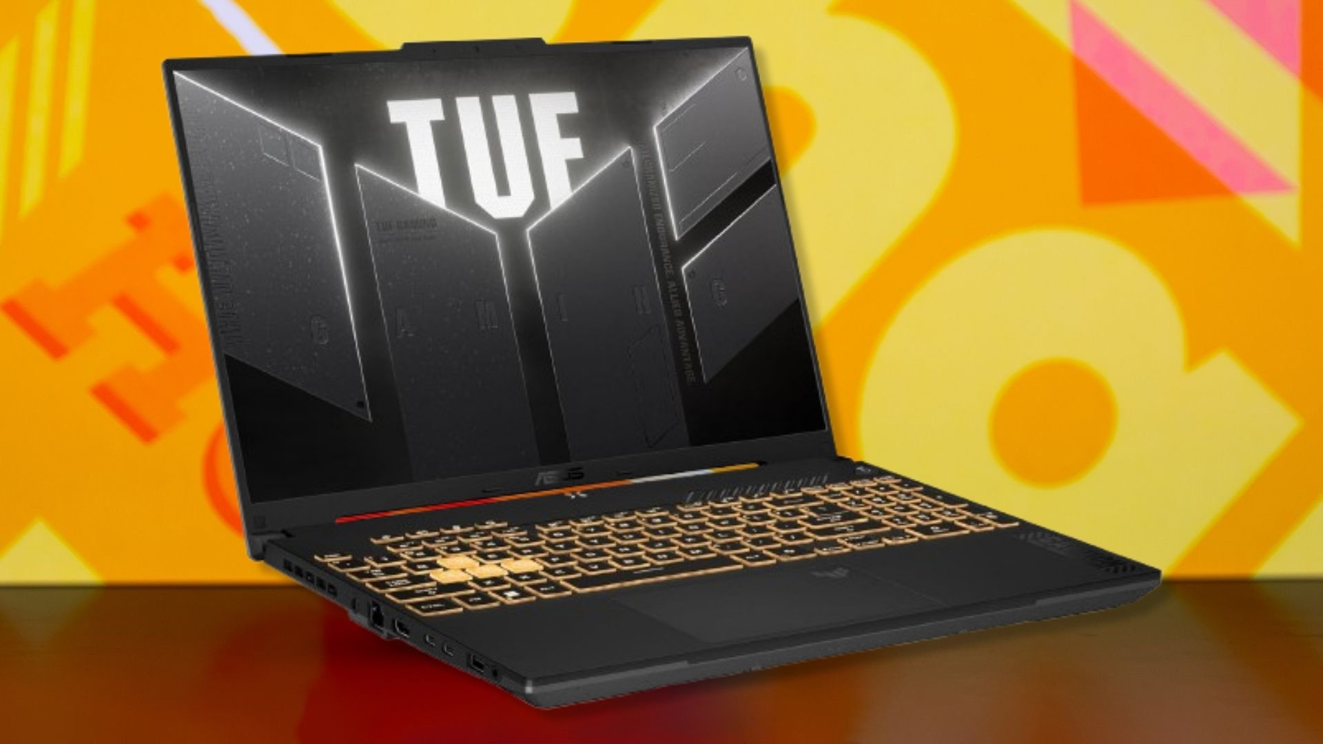The ASUS TUF Gaming F16 Gaming Laptop on an orange background