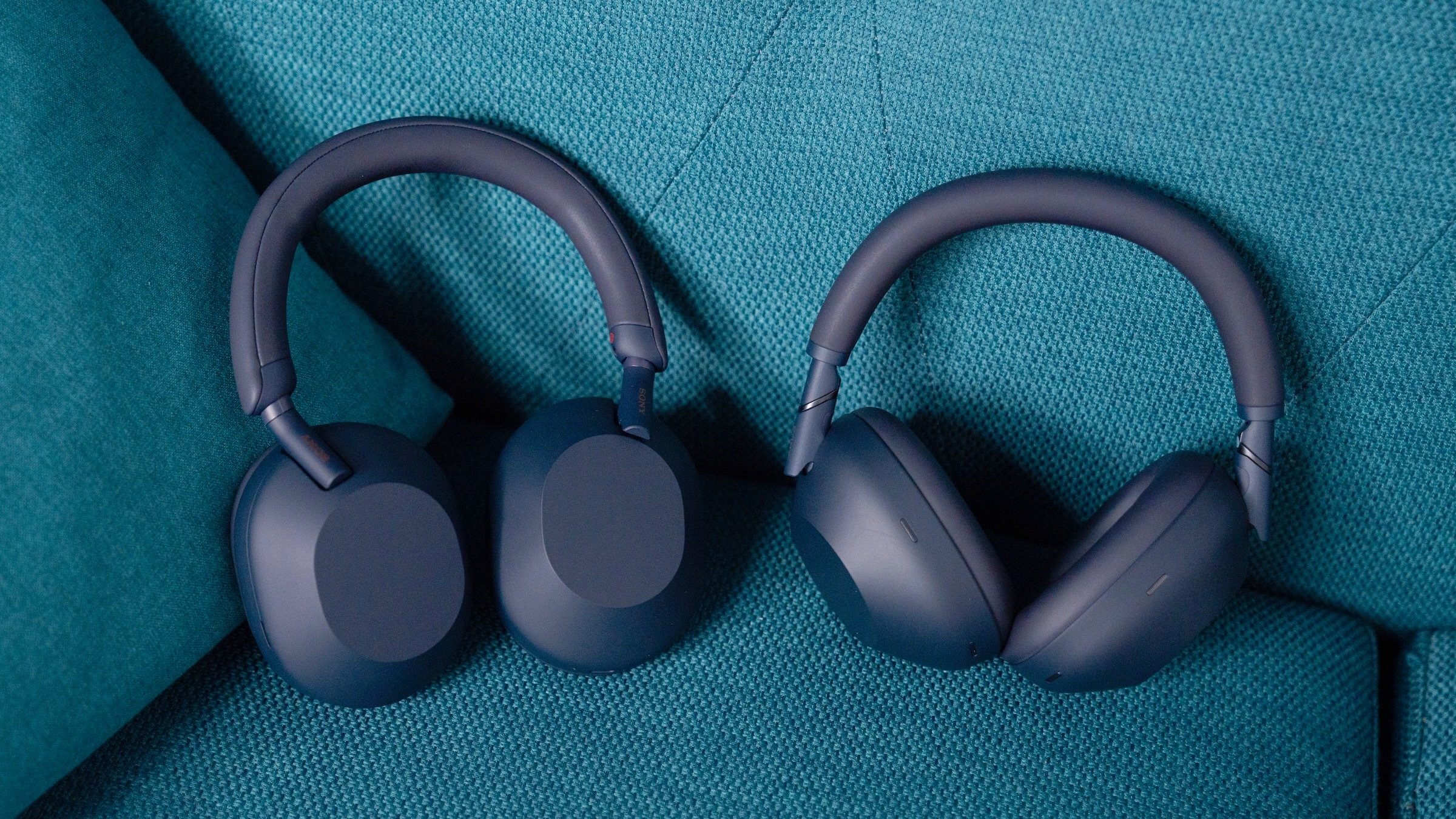the sony xm5 and xm6 headphones on a couch
