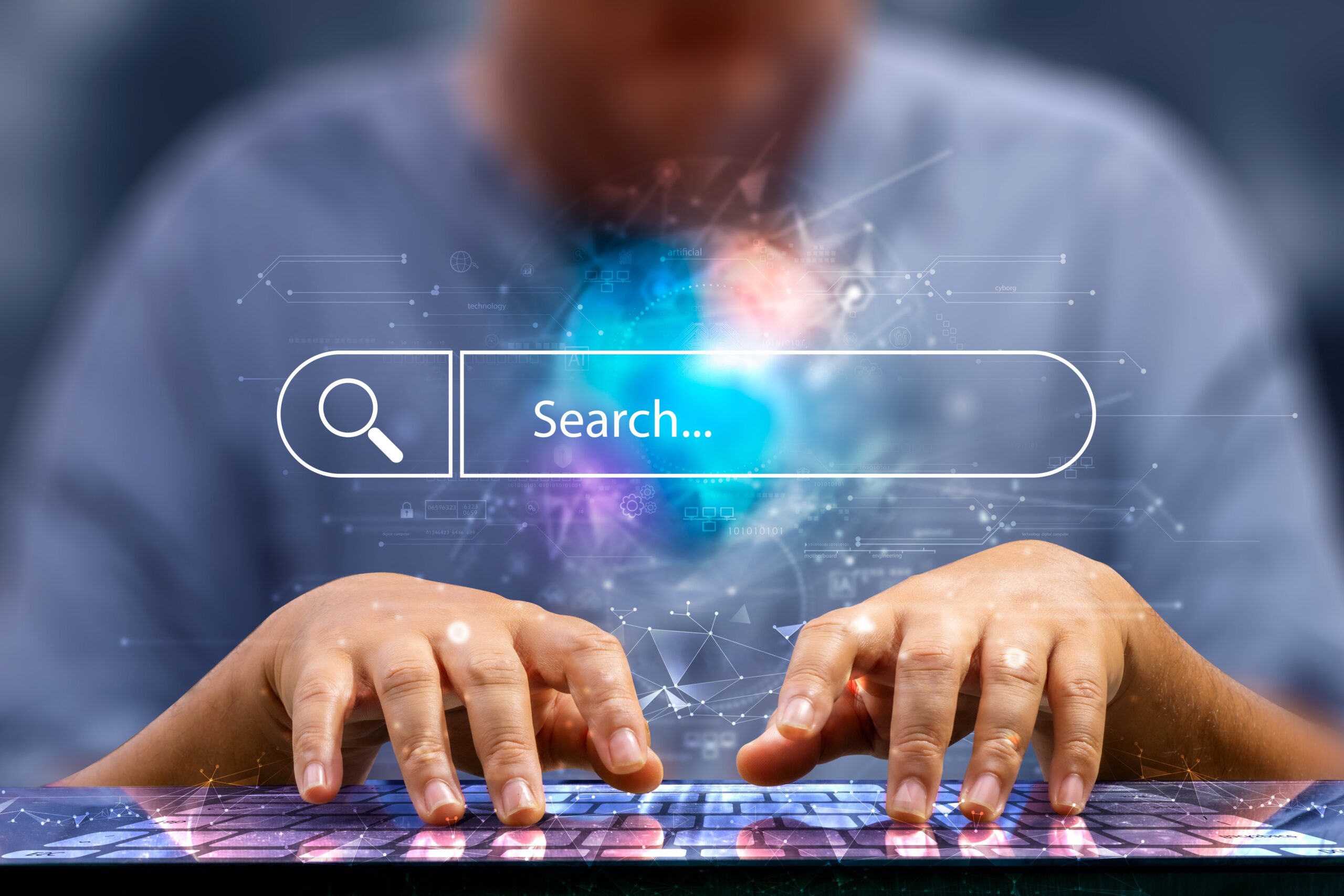 A person using a keyboard as the image of a search bar hovers above their hands.