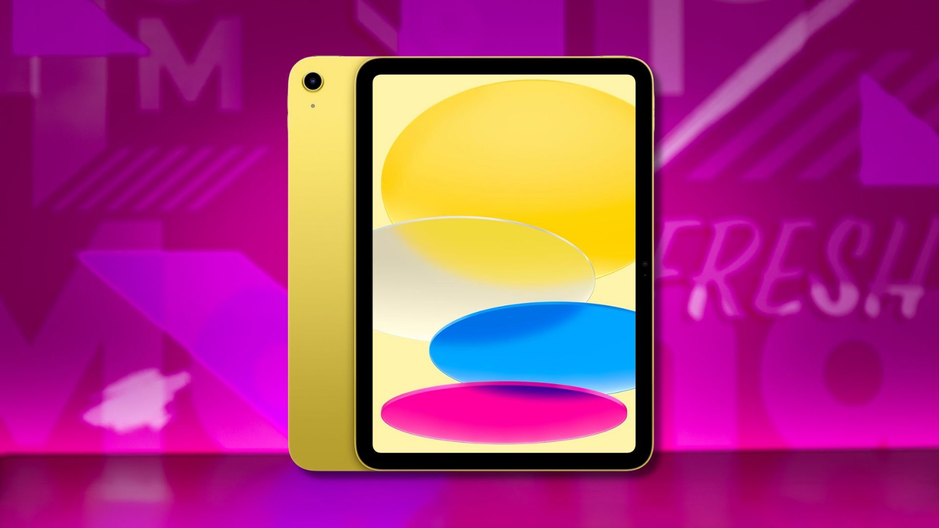 yellow apple ipad against a pink patterned background