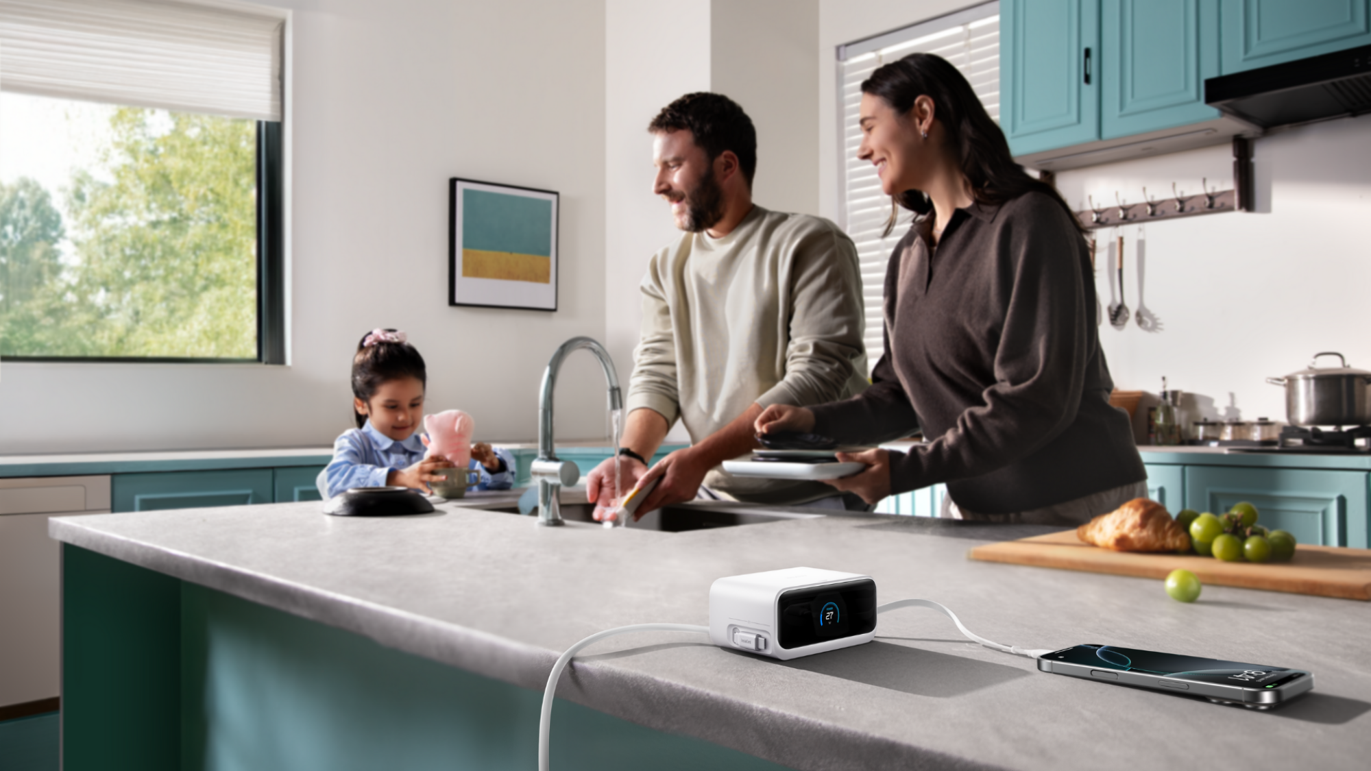 A family in the kitchen with an Anker Nano charging station nearby