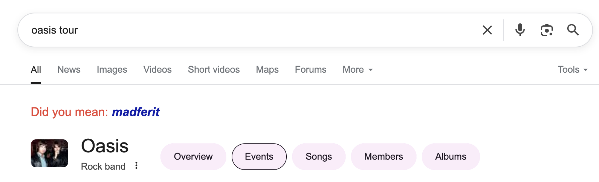 A screenshot of a Google Search result for "oasis tour" asking "did you mean: madferit."