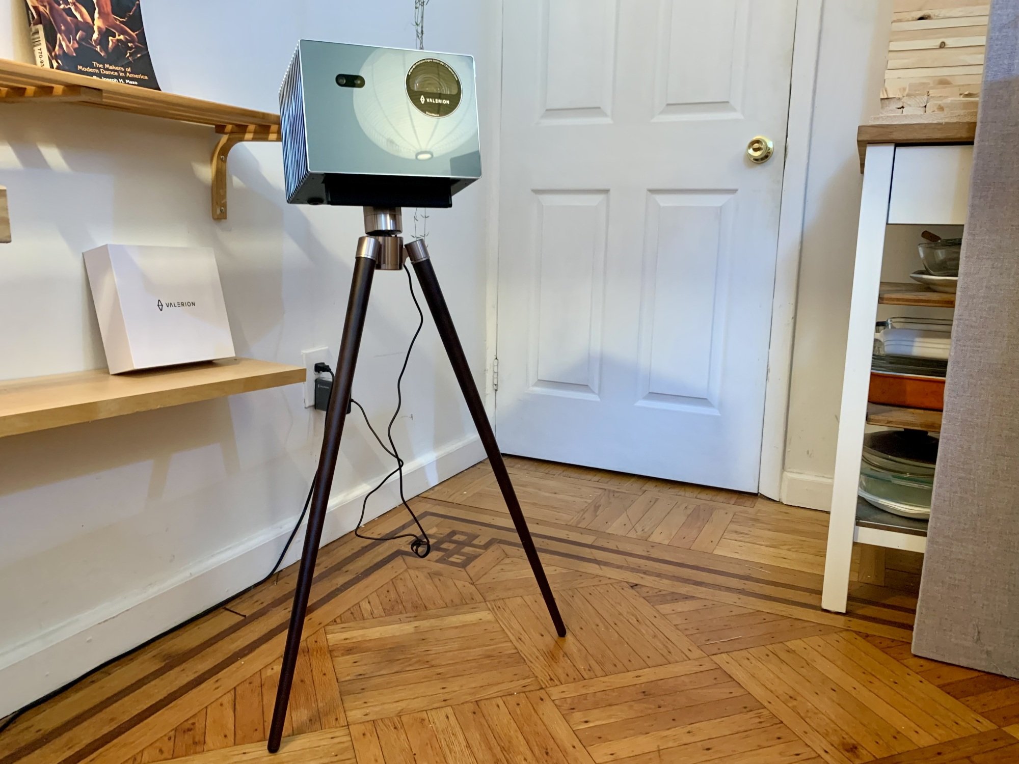 The VisionMaster Pro 2 appears on its tripod in a room.