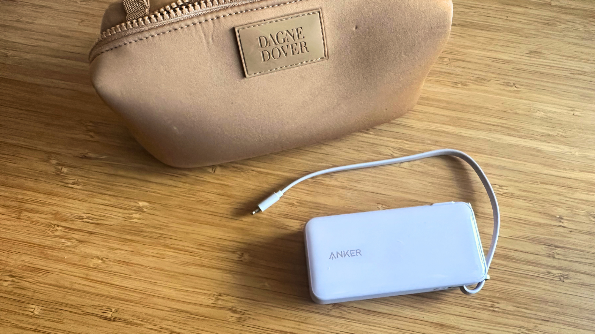 The Anker Nano power bank next to a Dagne Dover pouch.