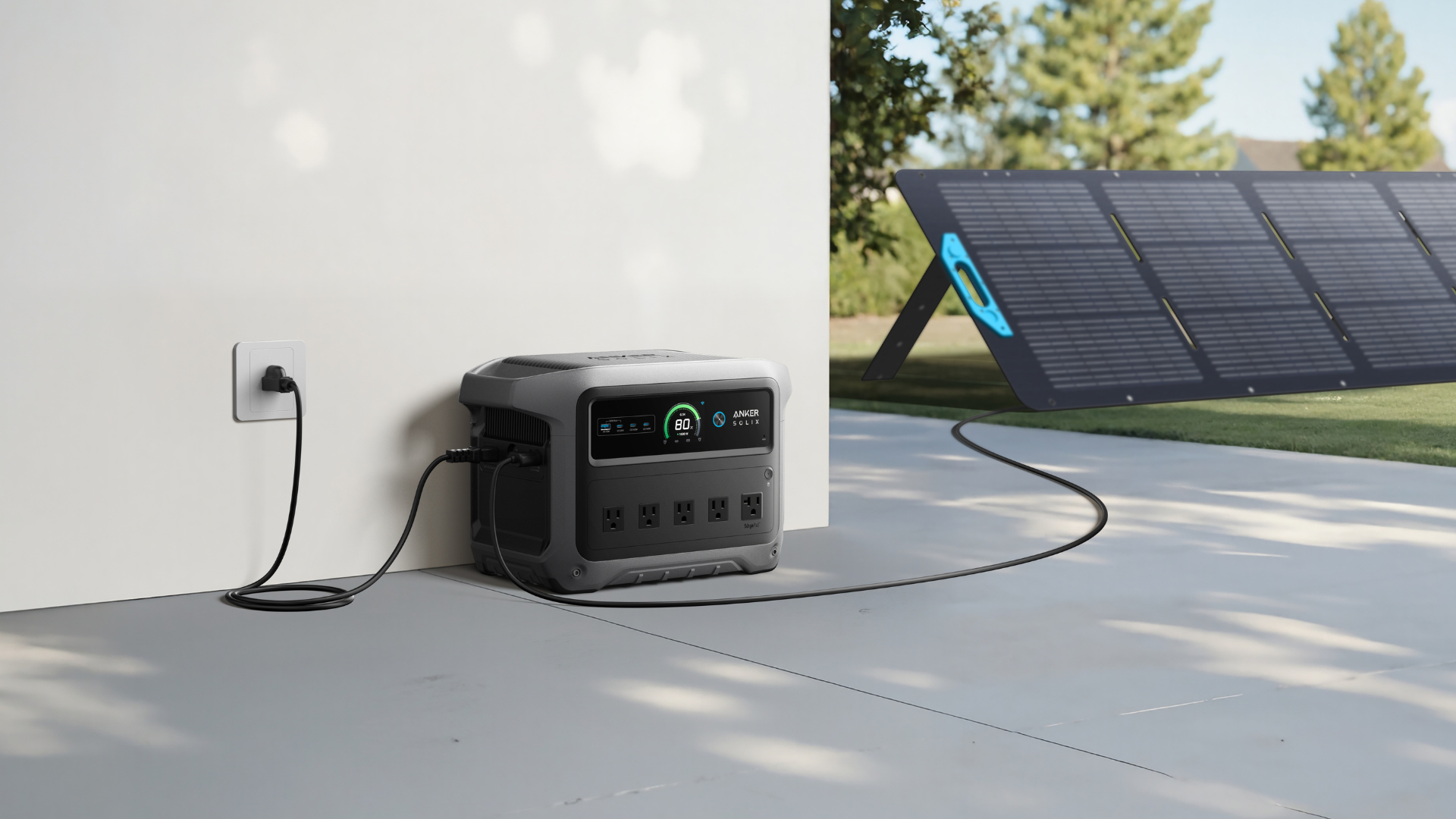 An Anker Power Station plugged into an outlet attached to a solar panel.