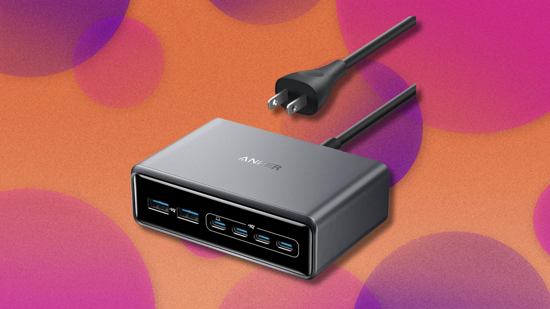 Anker Prime charging station on orange and purple abstract background