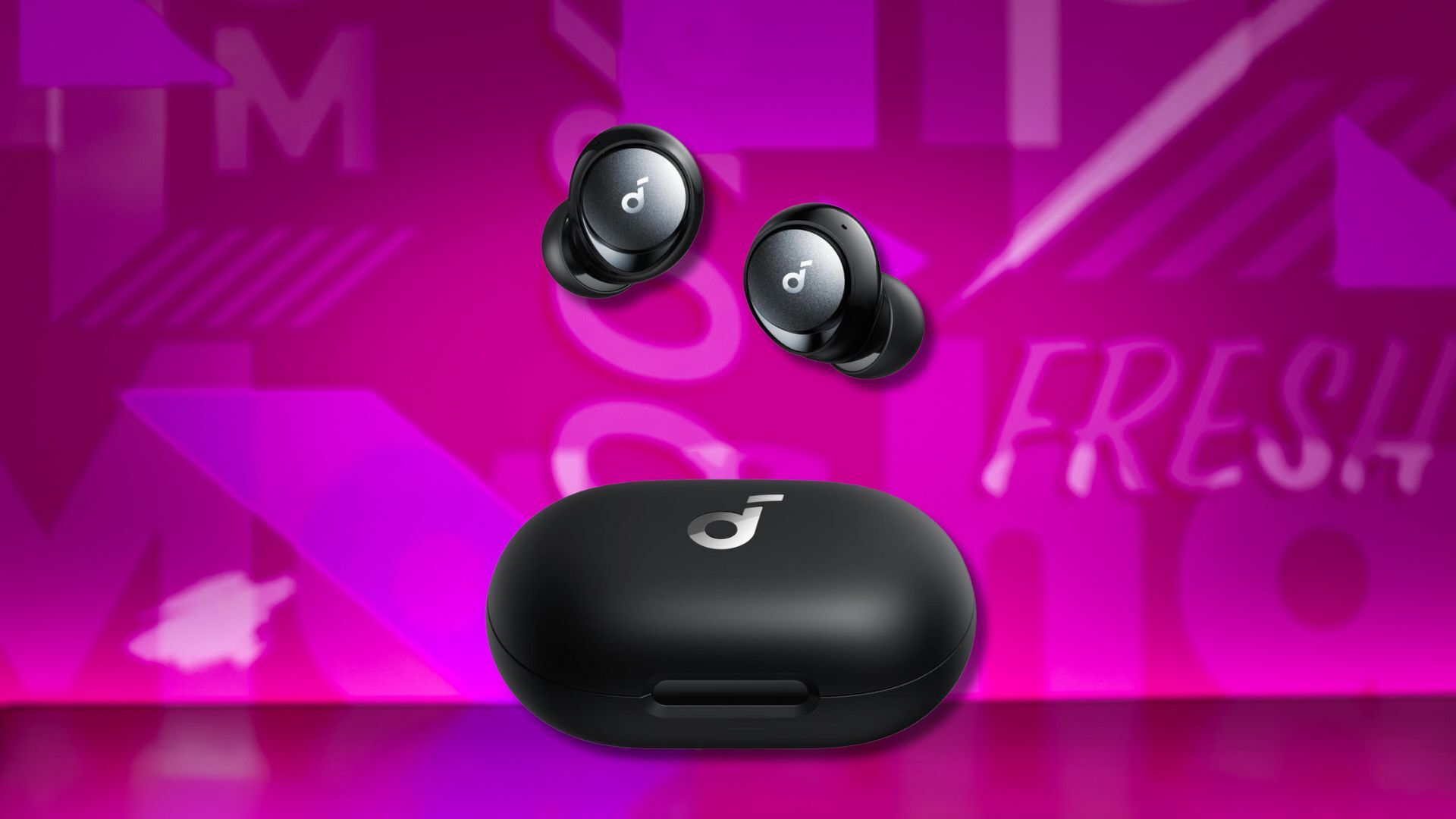 soundcore by anker space a40 earbuds against a pink patterned background