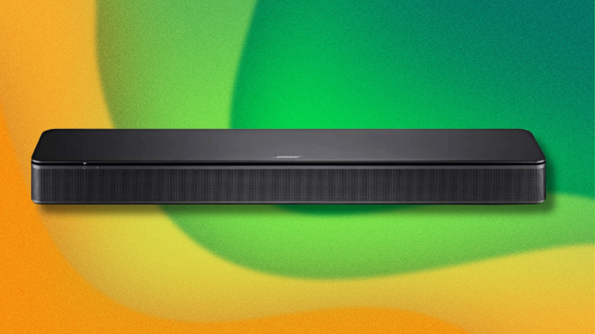Bose TV speaker soundbar on green and yellow abstract background