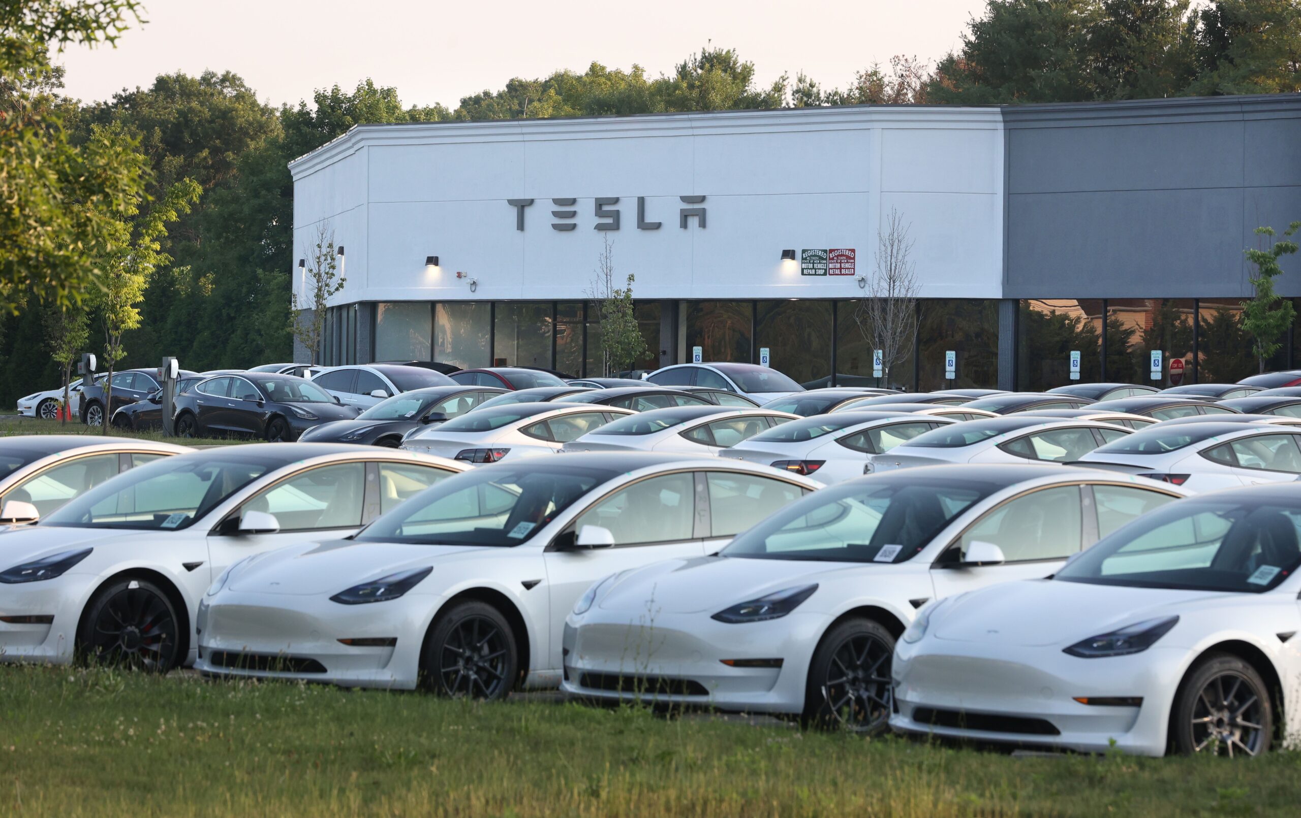  New Tesla electric vehicles fill the car lot at the Tesla retail location on Route 347 in Smithtown, New York