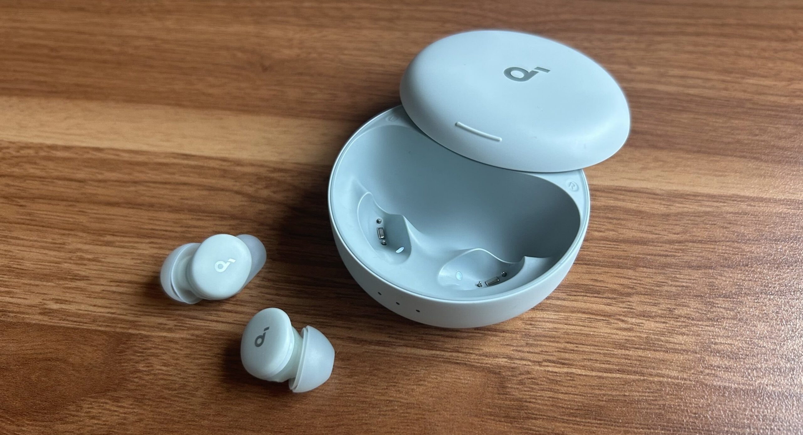 mint soundcore sleep a30 earbuds and case on desk