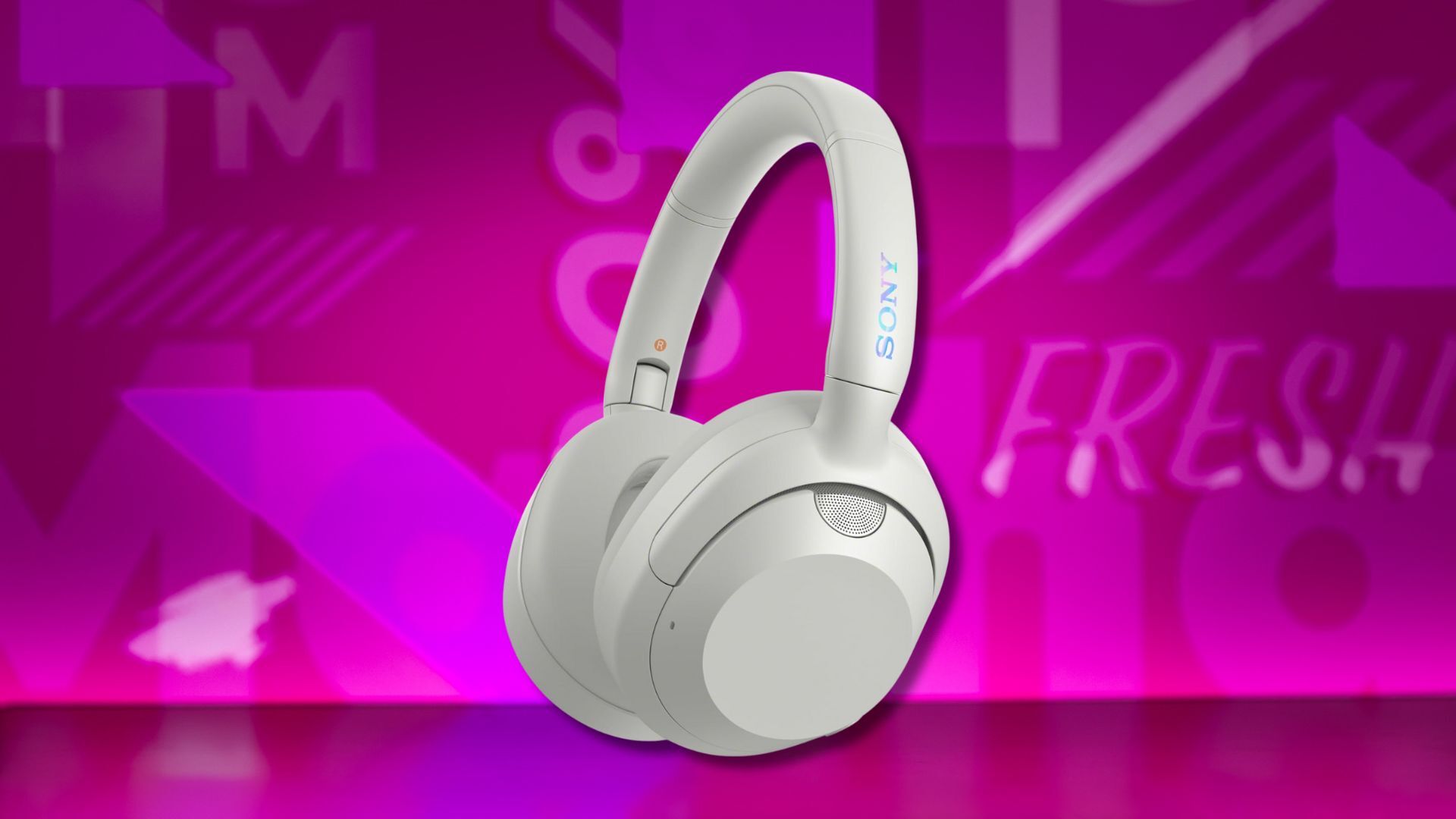 sony ult wear headphones against a pink patterned background