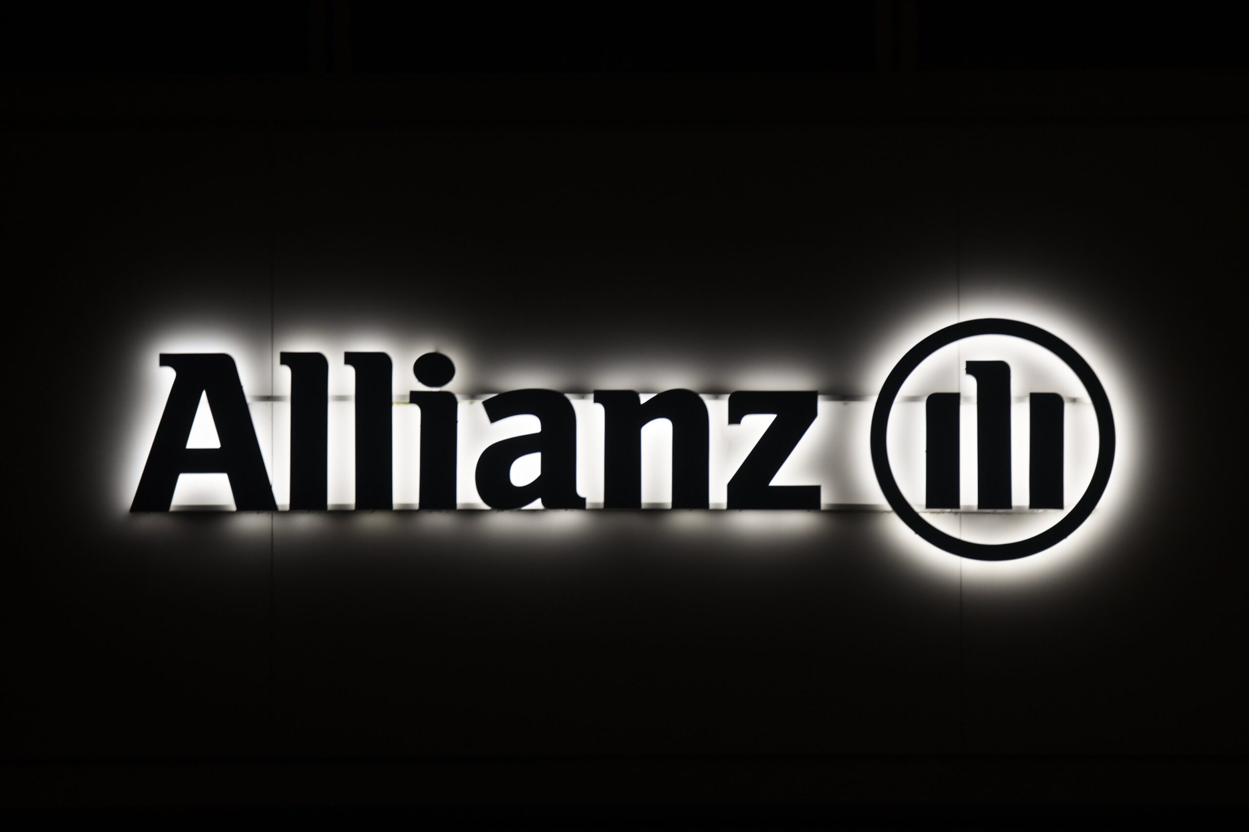 allianz logo lit up on a building