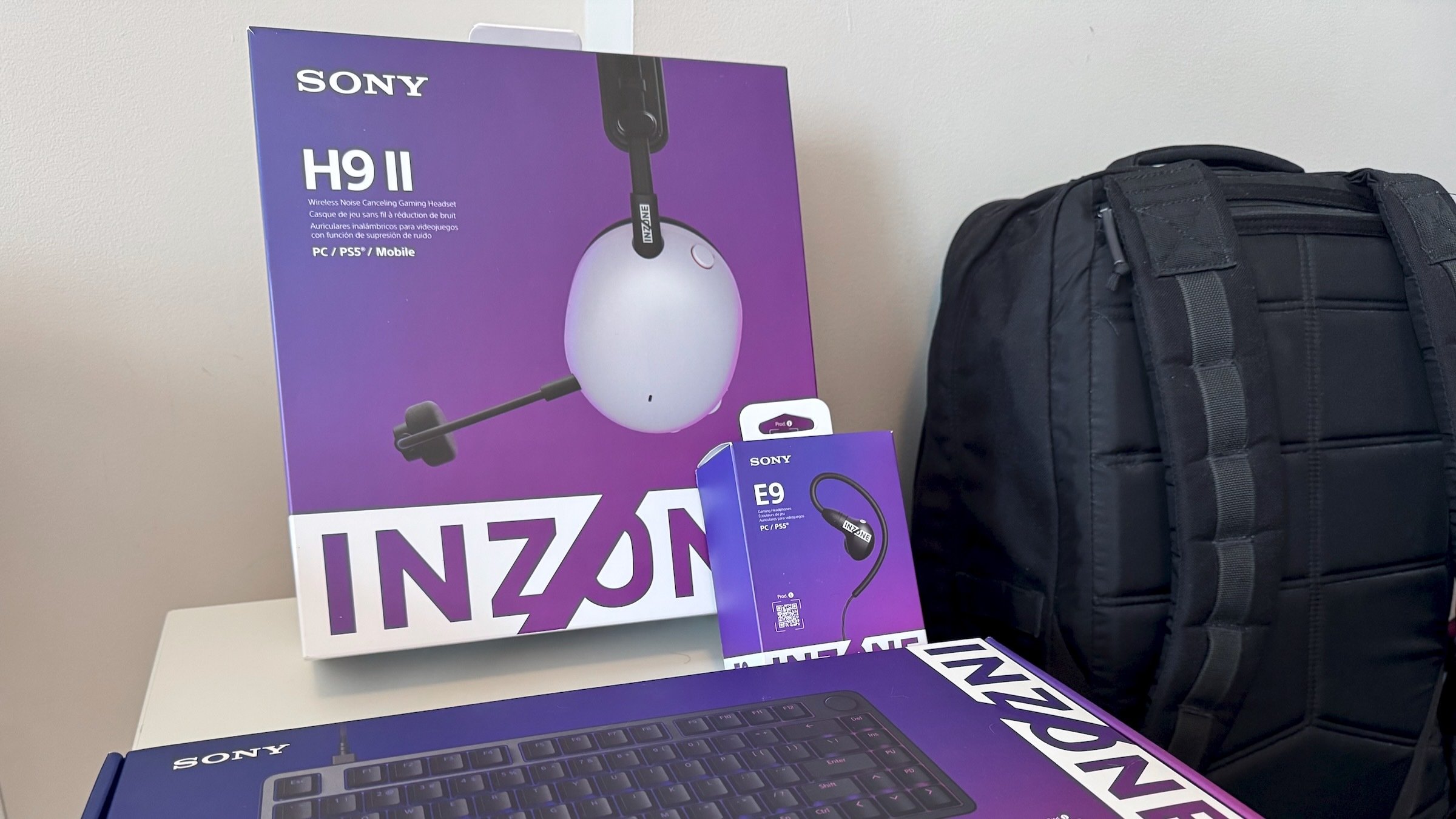 sony inzone gaming products in boxes next to backpack