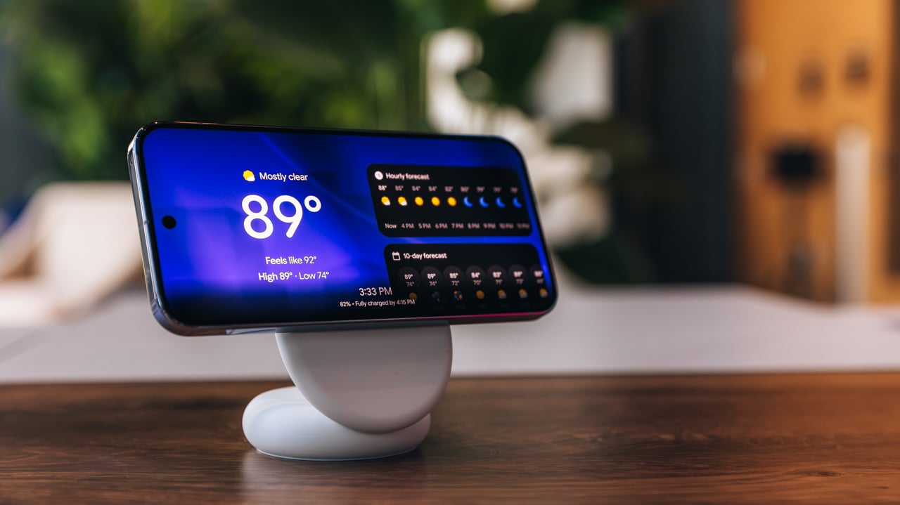 a pixelsnap charger and stand holding a pixel 10 phone