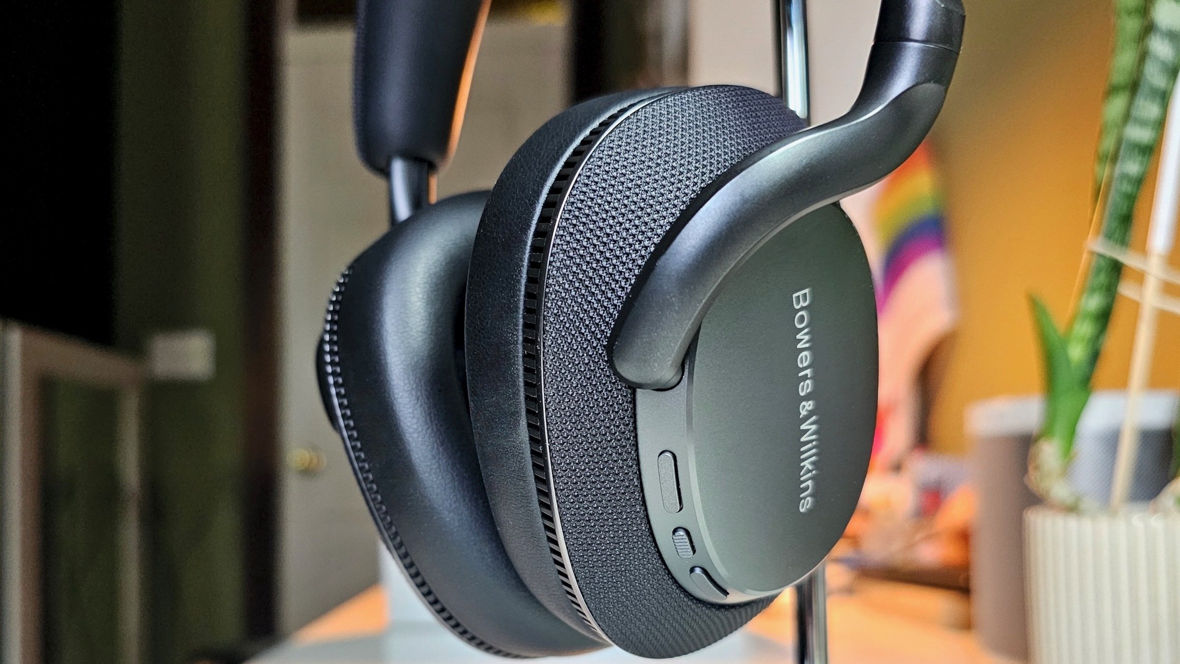 bowers and wilkins px7 s3 over-ear headphones on a stand