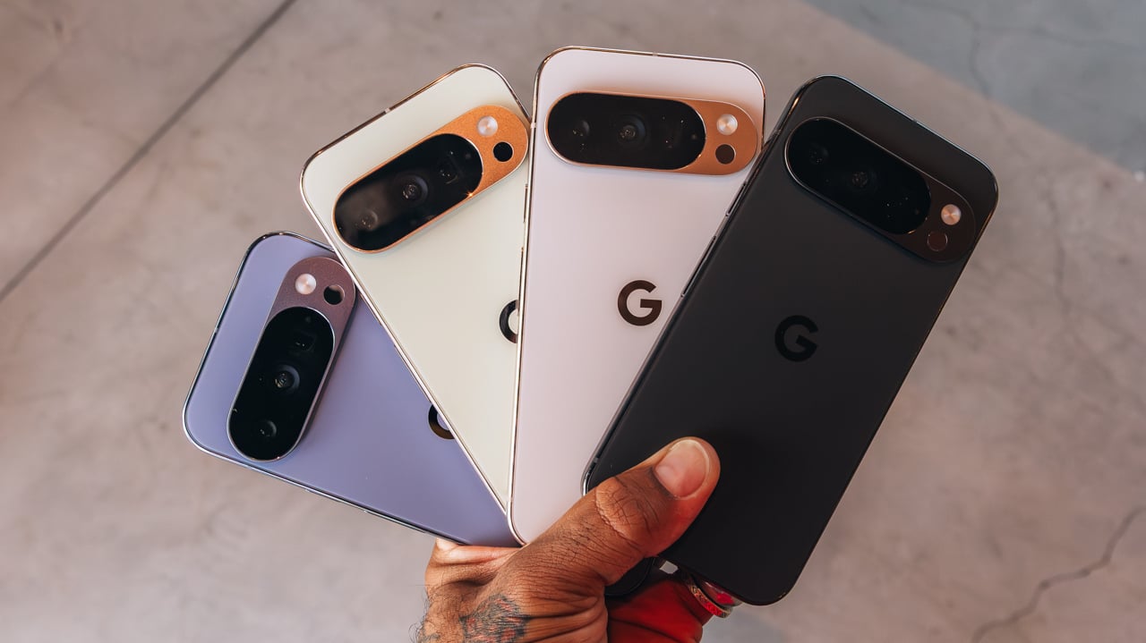 Google Pixel 10 Pro phones in a man's hand