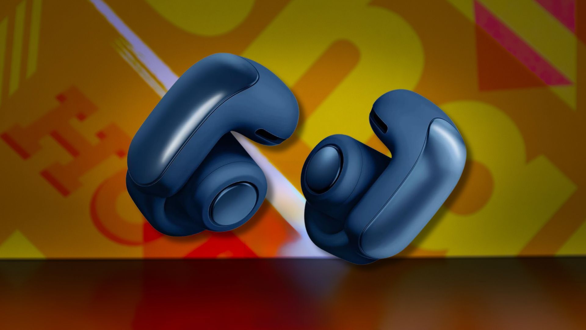 bose ultra open earbuds against a dark yellow patterned background