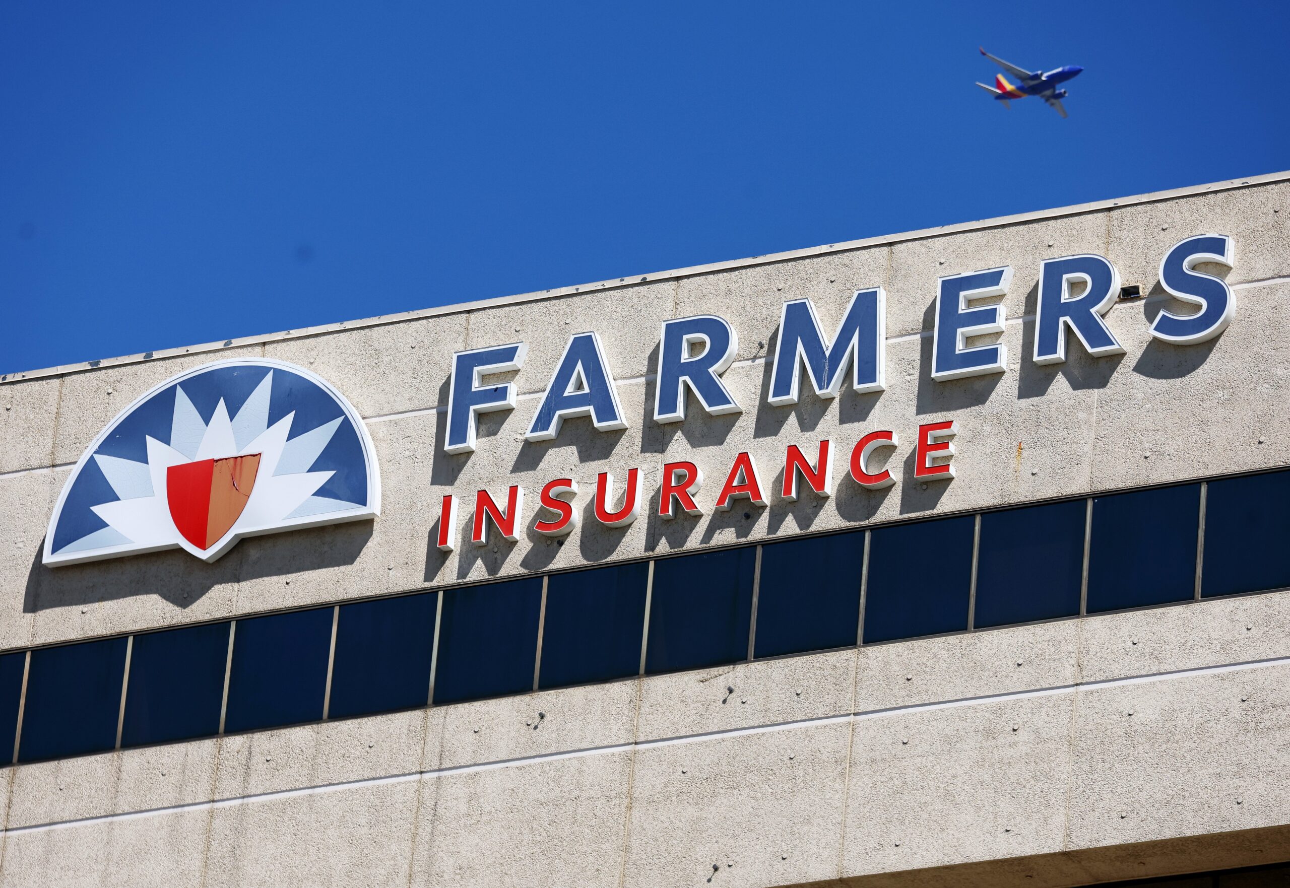 The Farmers Insurance logo is displayed at company headquarters on August 29, 2023 in Woodland Hills, California