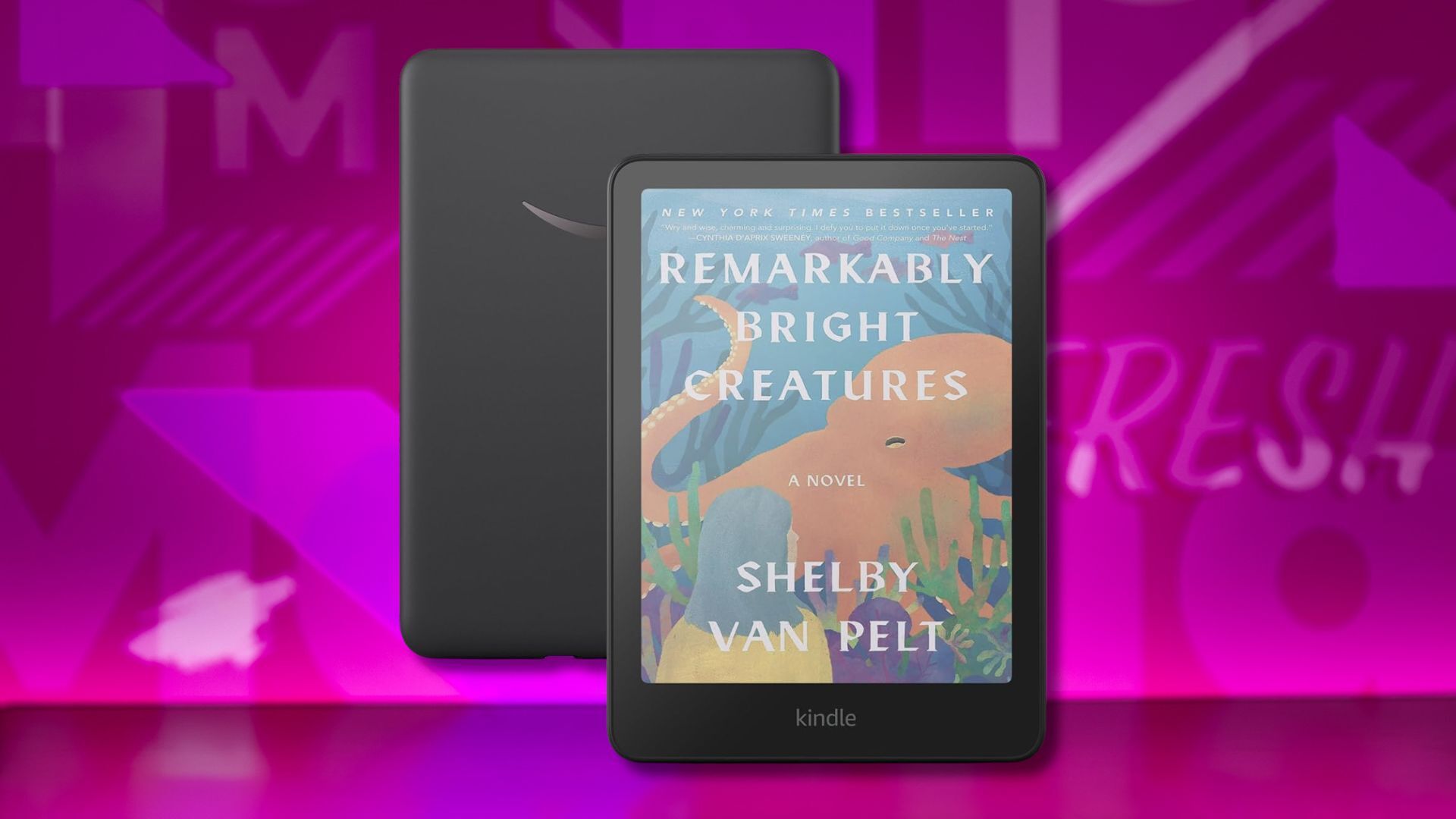 amazon kindle colorsoft e-reader against a pink patterned background