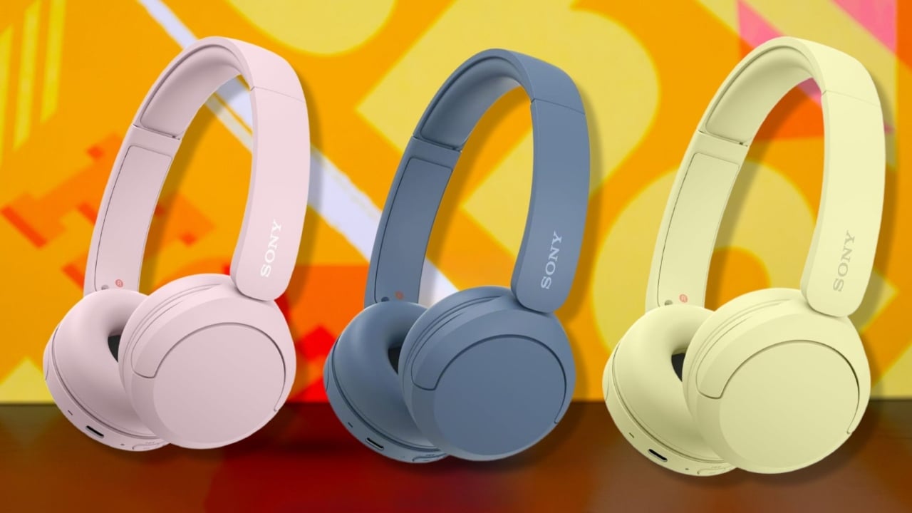 The Sony WH-CH520 Wireless Headphones in pink, blue, and yellow, on an orange background