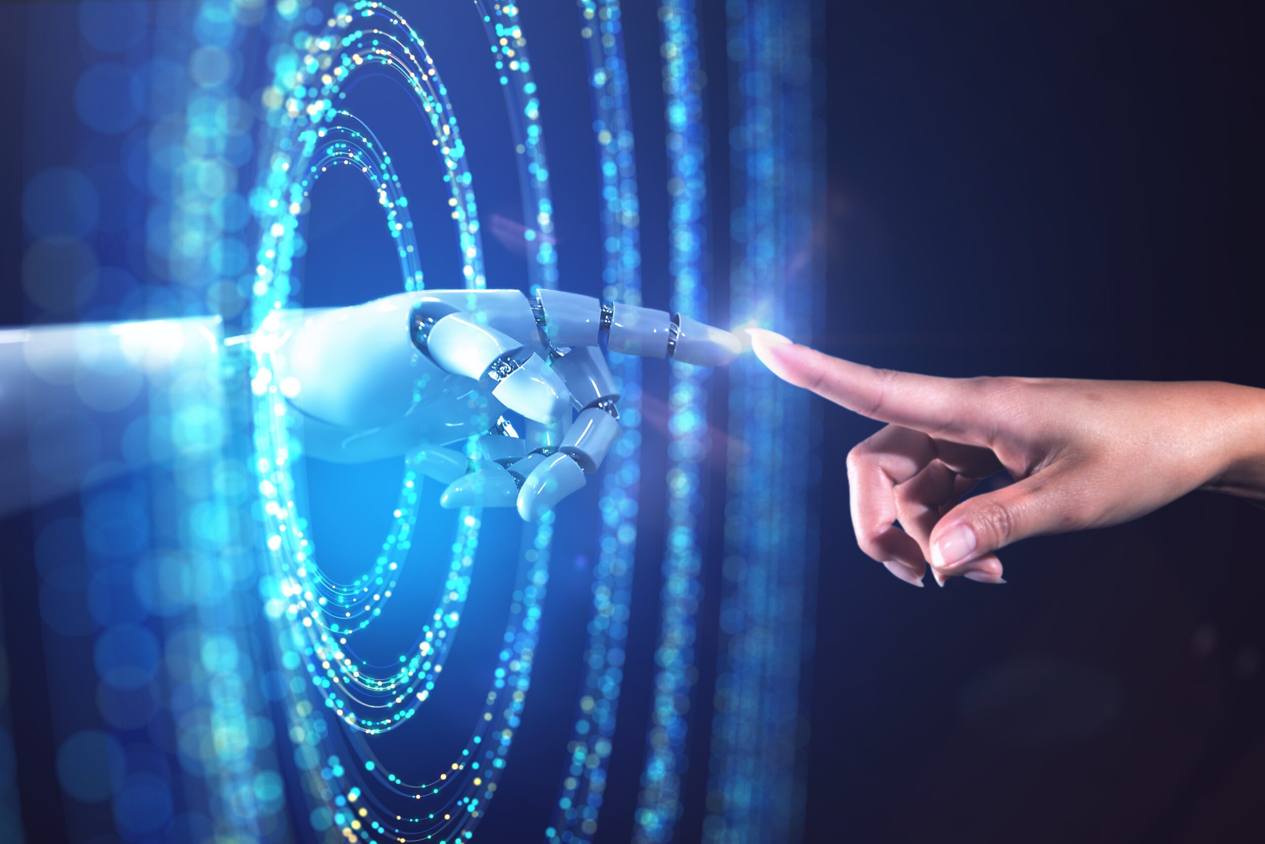 Abstract image of a woman's hand accessing the digital world from the real world.