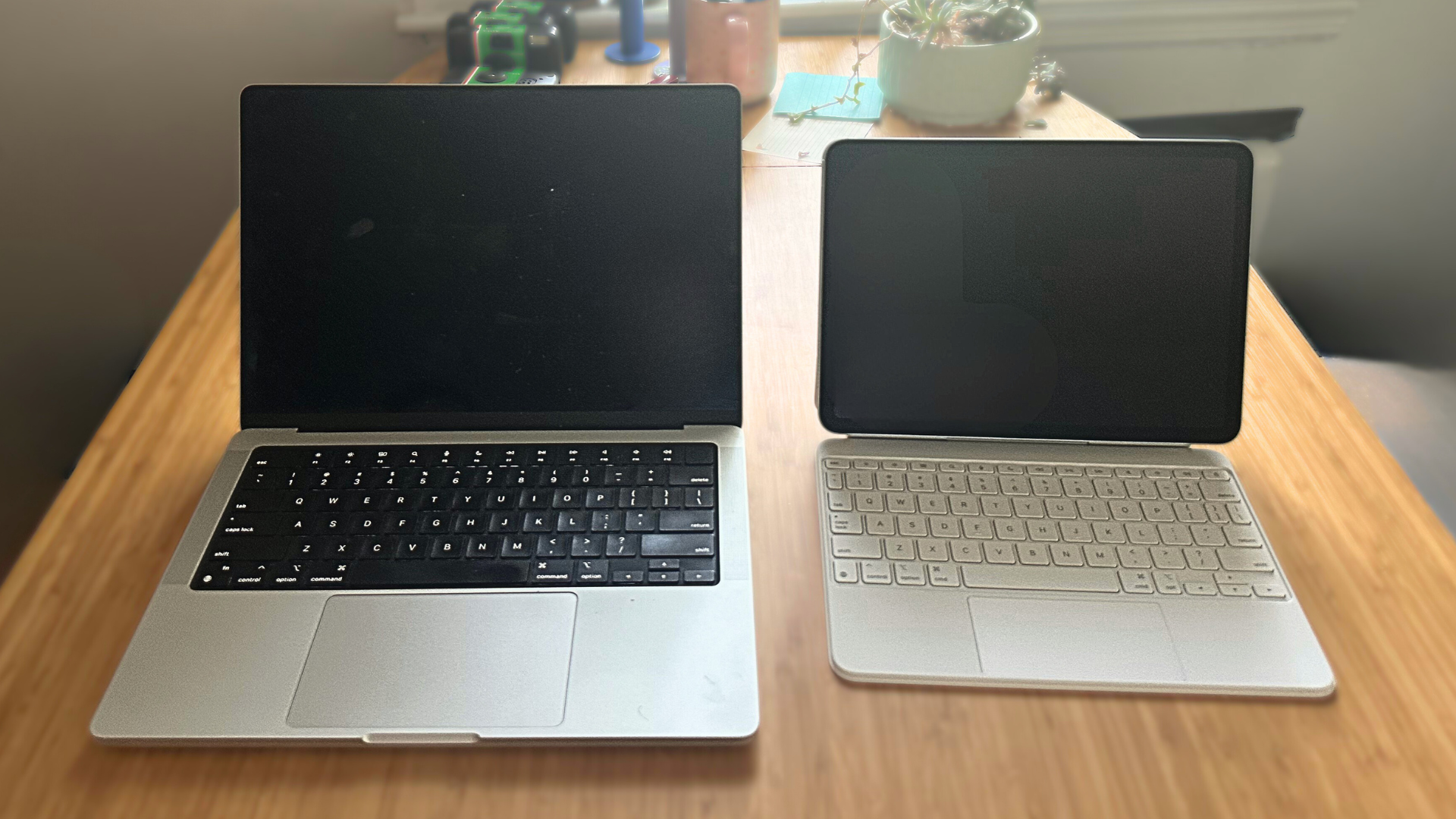 A MacBook Pro and an iPad Air next to each other