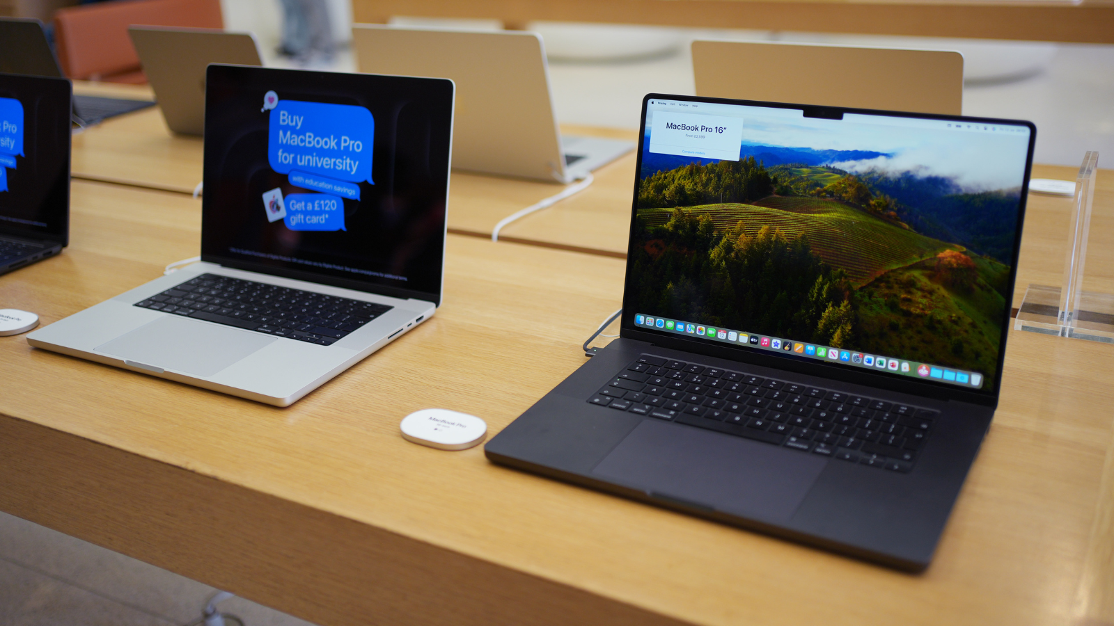 m4 apple macbook pros on display in an apple store